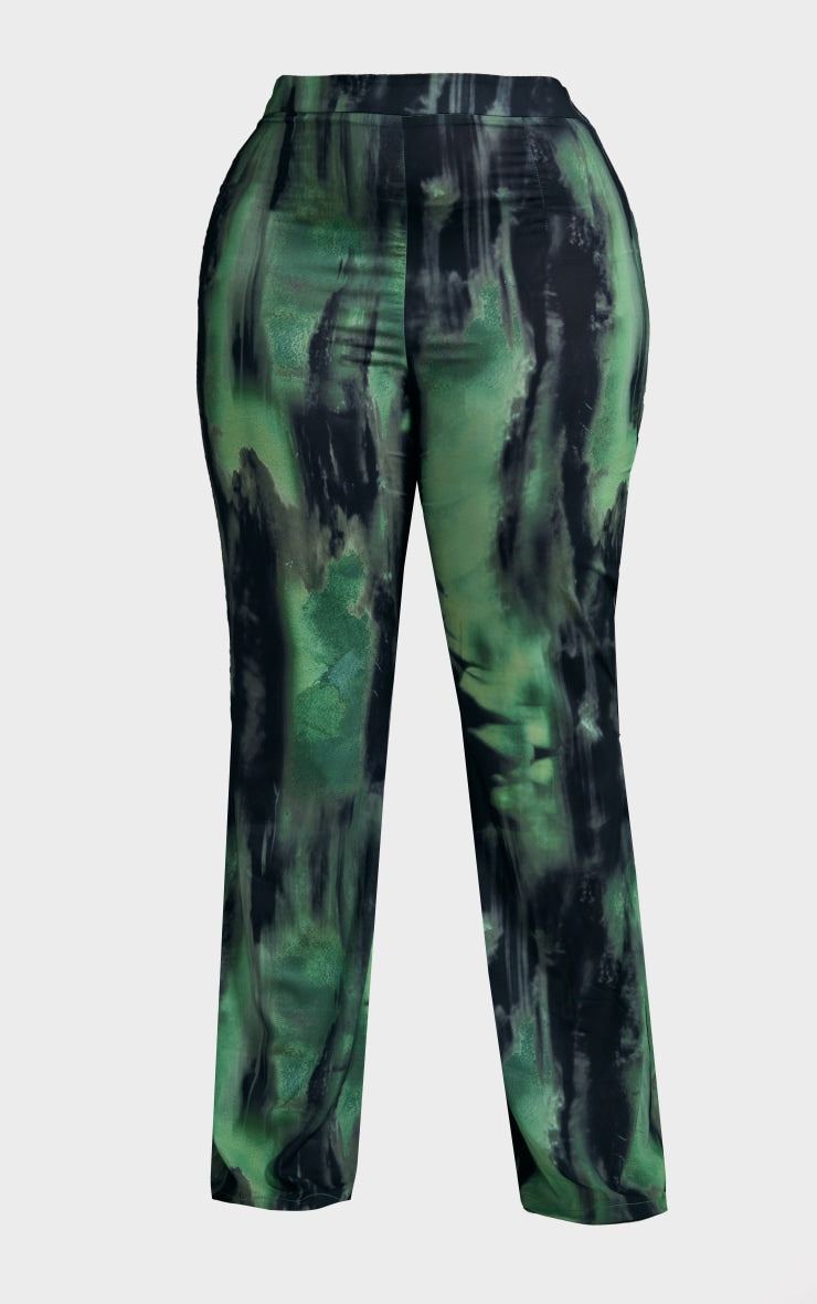 Plus Green Grunge Print Chiffon Flare TrousersElevate your after-dark style with these chiffon flare trousers, rendered in a hypnotic green grunge print. The fluid drape of the chiffon creates a sophisticated siRedemption By Ashley NorthPlus Green Grunge Print