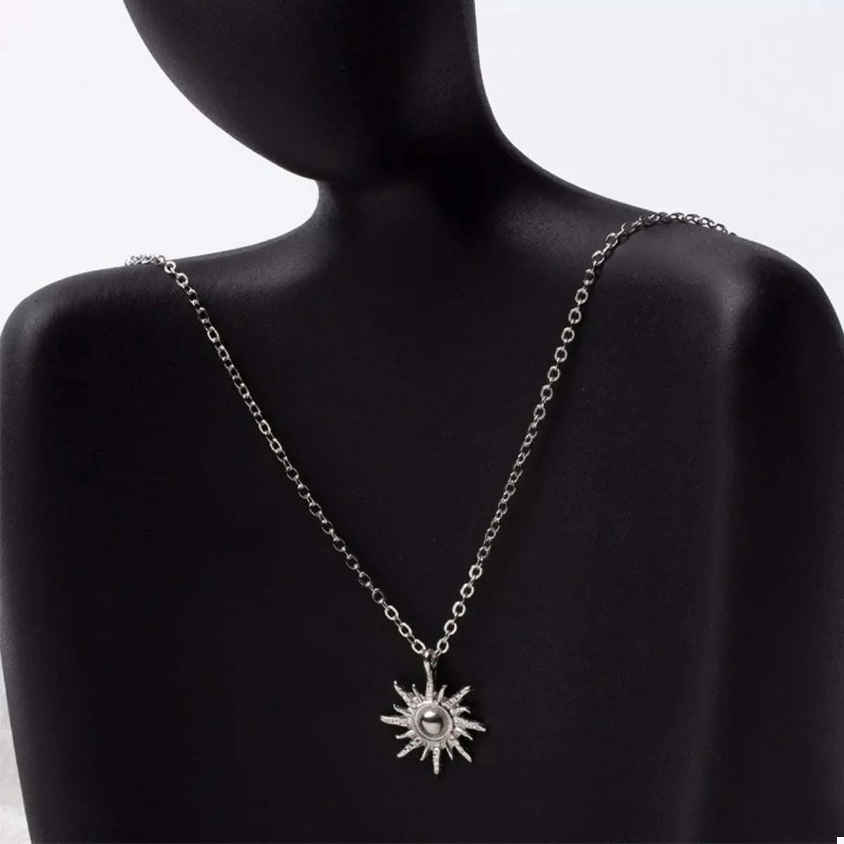 Sunburst Pendant NecklacePieces:1-piece
Material:18K Gold-Plated,Zinc alloy,Silver-plated
Care instructions:Avoid wearing during exercise, as sweat will react with the jewelry to produce silSunburst Pendant Necklace