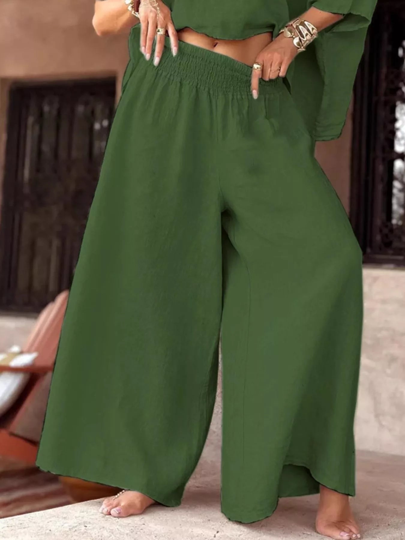 Plus size green full size boat neck top and wide leg pants set with no stretch and basic style.