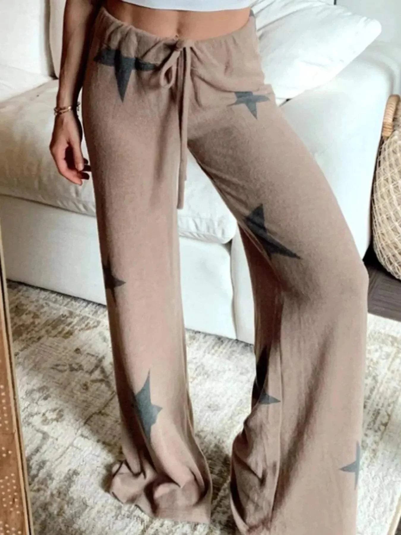Women's star print drawstring pants in stretchy brown fabric two-piece set with star print top