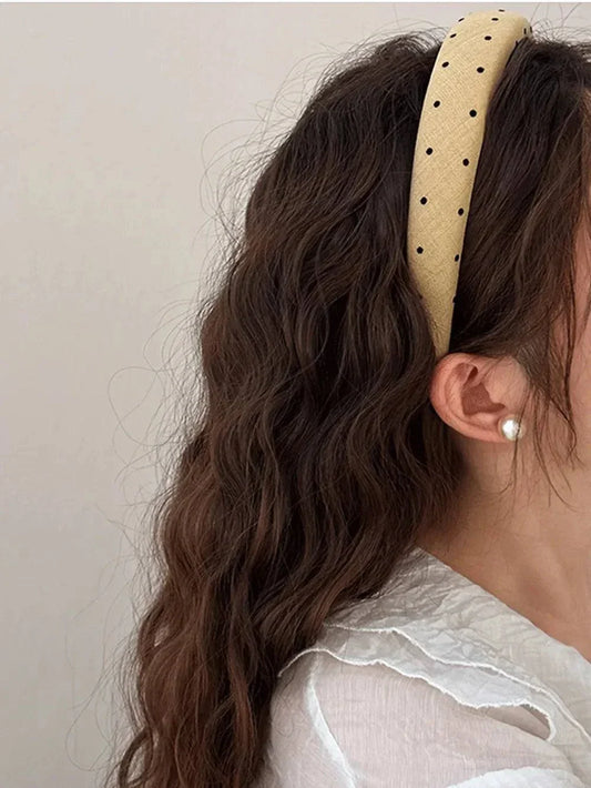 Polka Dot Polyester wide headband on wavy brown hair, beige with black dots