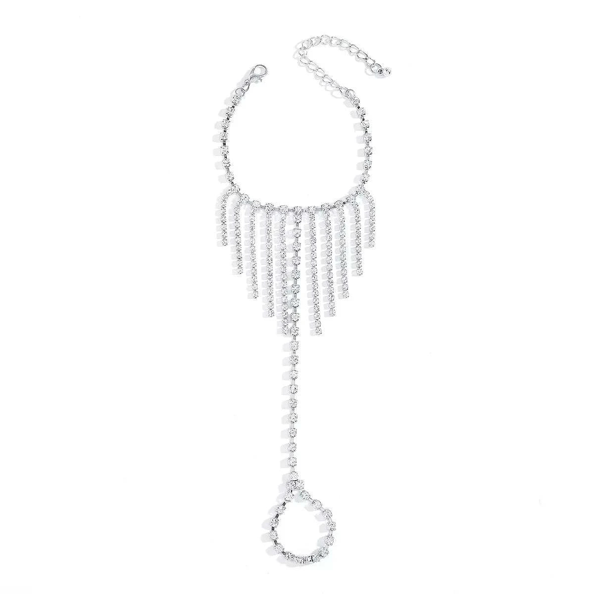 Rhinestone Fringe Hand Chain BraceletPieces:1-piece
Material:18K Gold-Plated,Iron,Rhinestone,Silver-plated
Care instructions:Avoid wearing during exercise, as sweat will react with the jewelry to producRhinestone Fringe Hand Chain