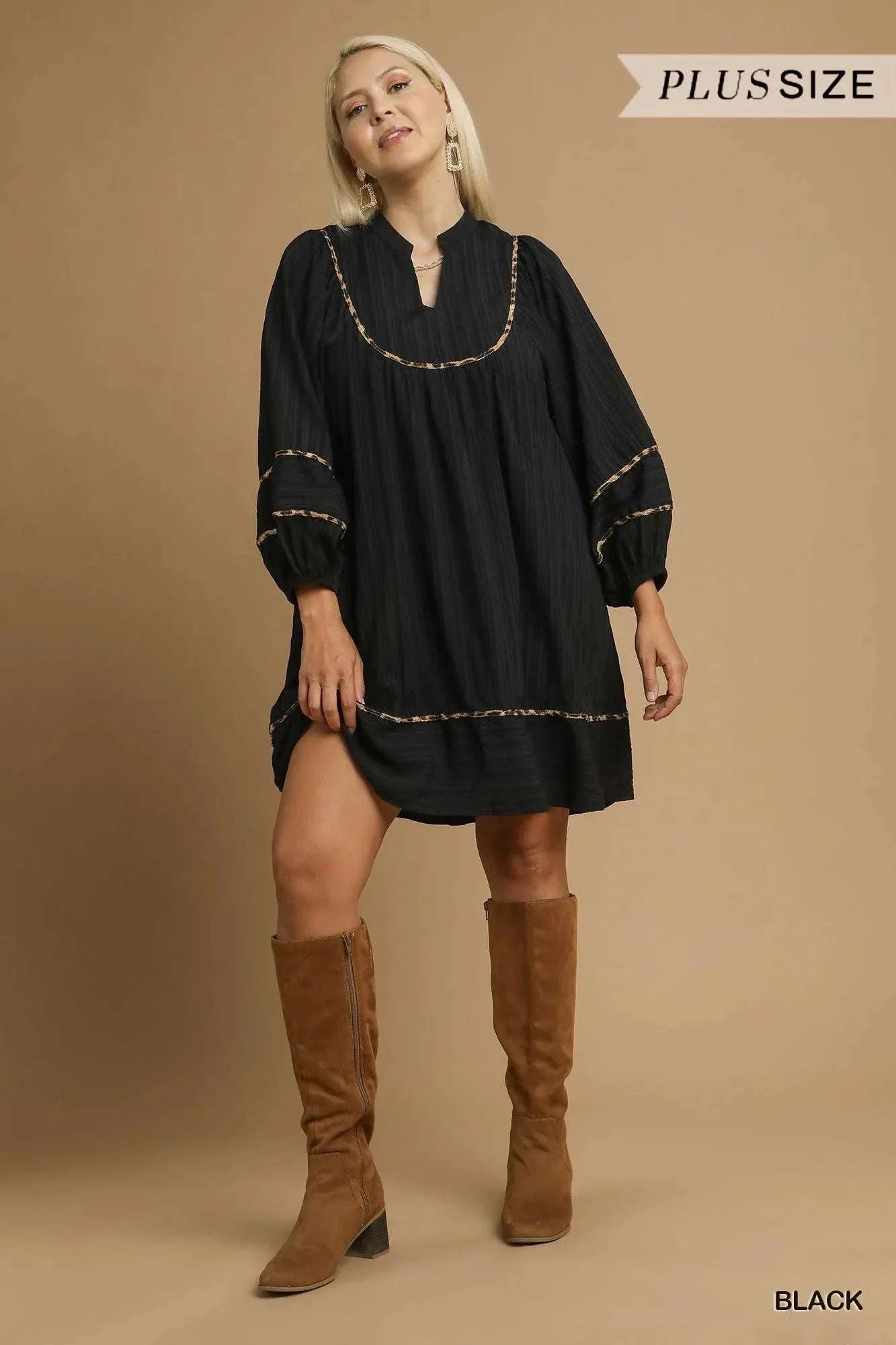 Umgee plus size black babydoll dress with leopard trim and textured fabric worn with brown boots