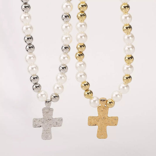 Pearl and cross pendant necklaces with 18K gold-plated and silver accents on synthetic pearl chains