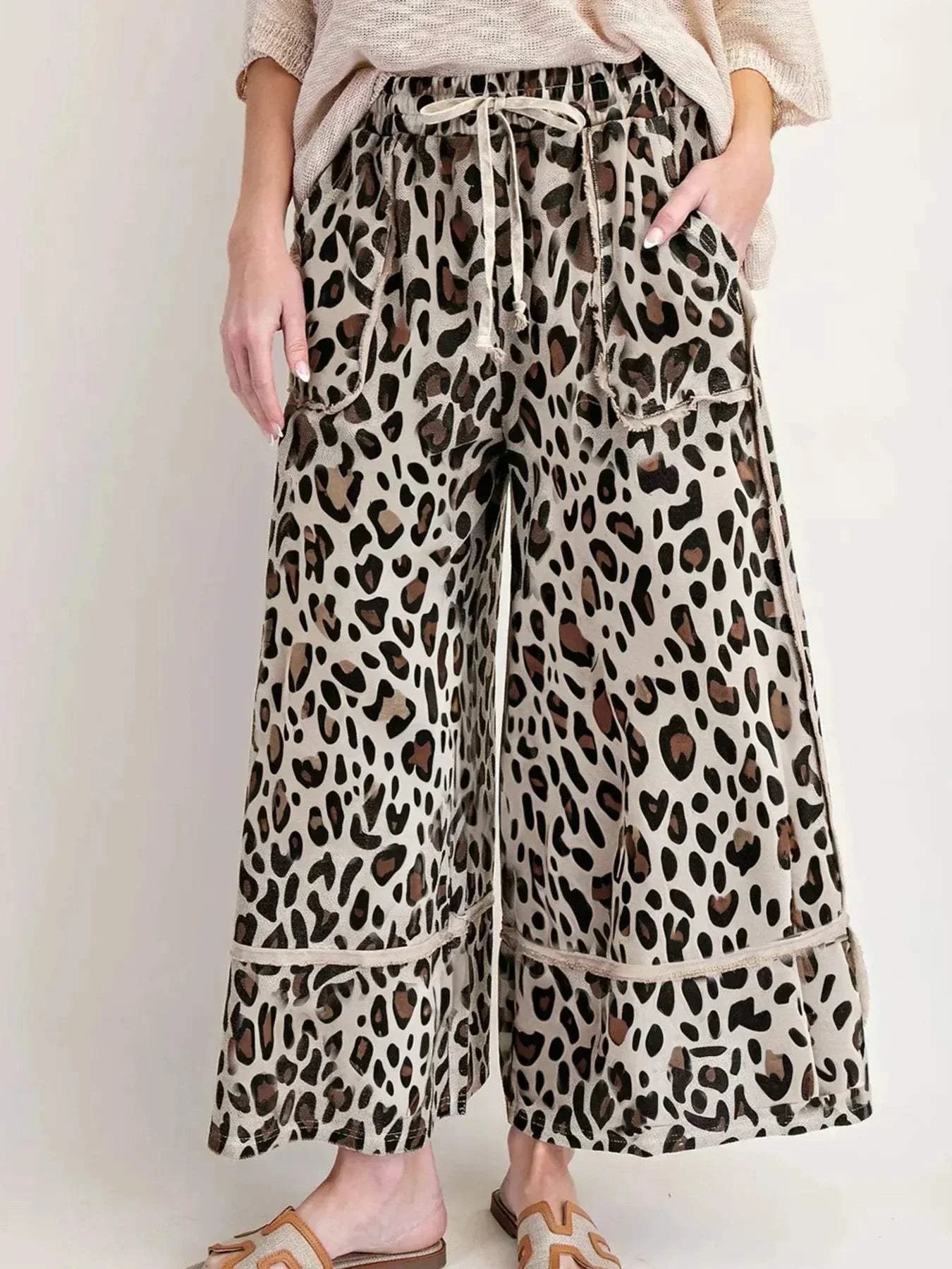 Leopard Print Wide Leg Drawstring PantsFeatures:Drawstring,Pocketed
Material composition:95% polyester, 5% elastane
Care instructions:Machine wash cold. Tumble dry low.
Imported
Product Measurements (MeasRedemption By Ashley NorthLeopard Print Wide Leg Pants
