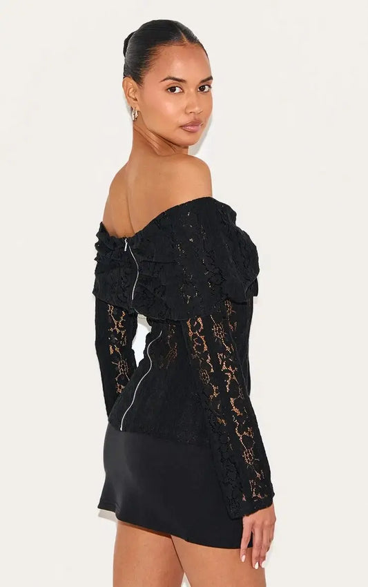 https://cdn-img.prettylittlething.com/c/e/4/9/ce4919f41719feb37556761e0c181d6236631f19_CNL7495_2_black_fitted_lace_flared_sleeve_bardot_top.jpg