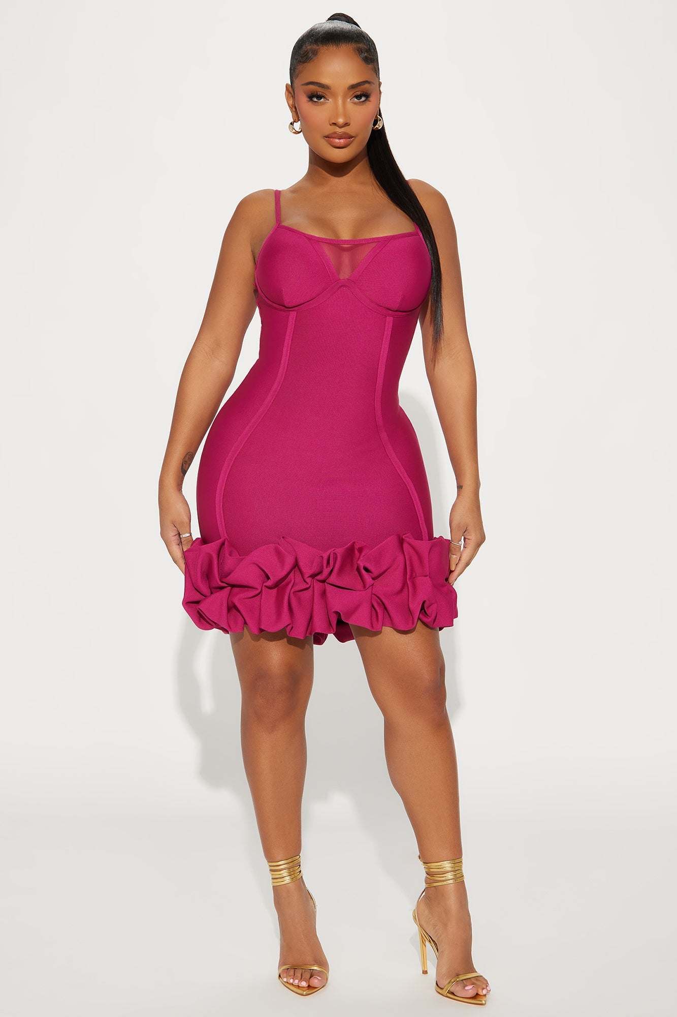 Model wearing magenta Everly Bandage Mini Dress with ruffled hem and thin straps