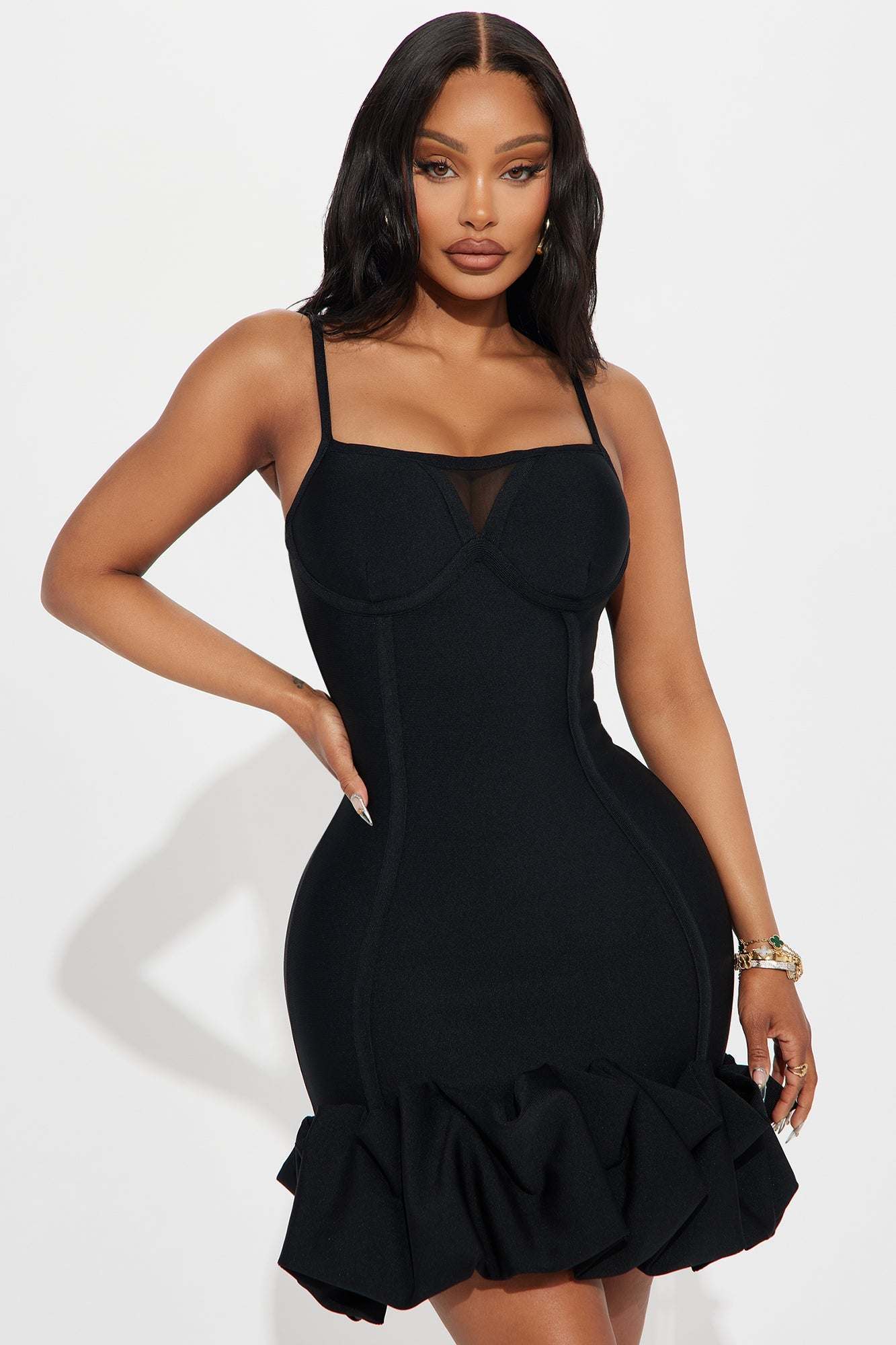 Black Everly Bandage Mini Dress with ruffled hem and spaghetti straps worn by model