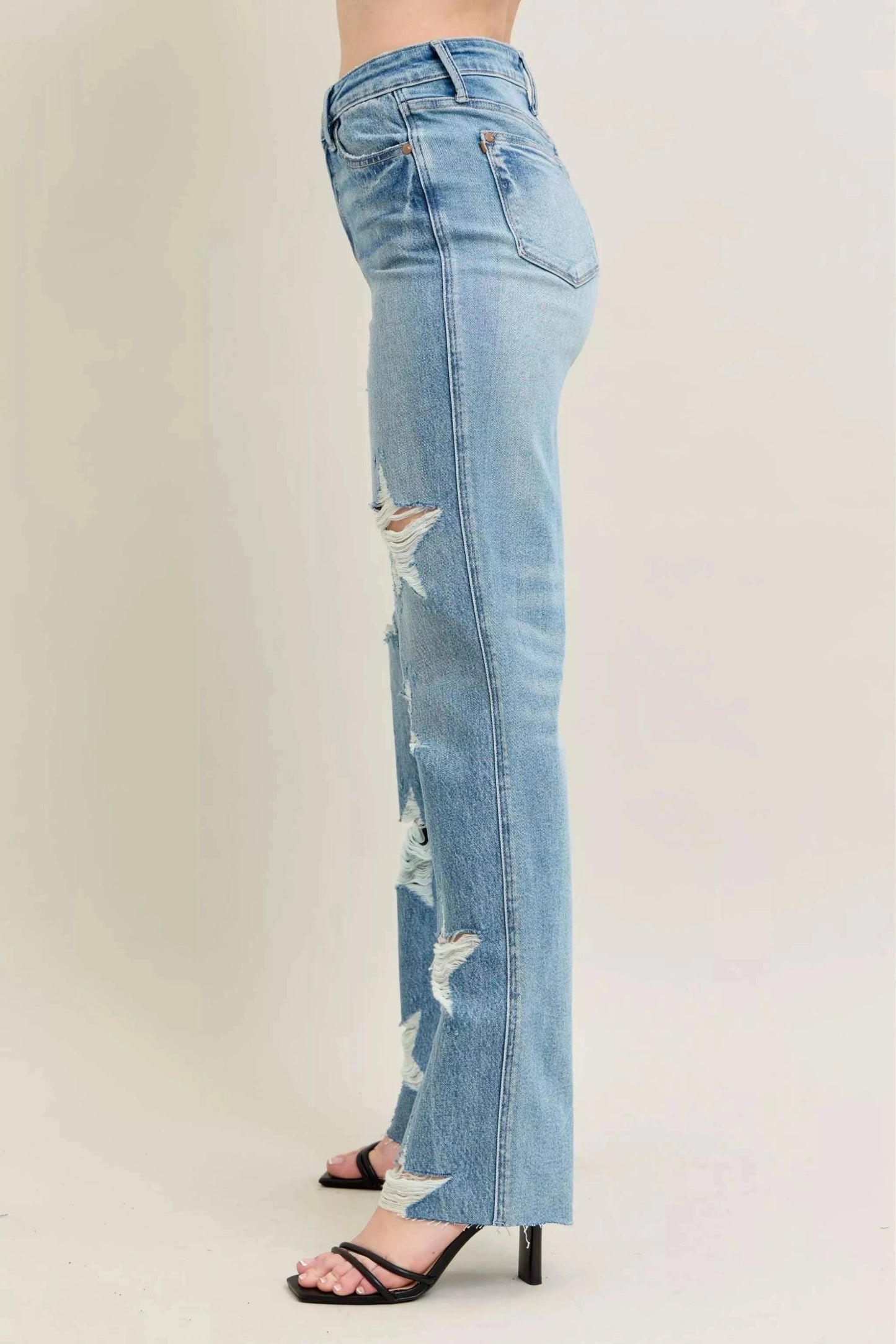 Side view of Judy Blue Plus Size 90's high waist straight jeans in light rigid denim with star-shaped distressed details