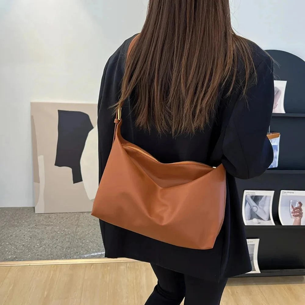 Adjustable PU Leather Handbag with Adjustable Strap.