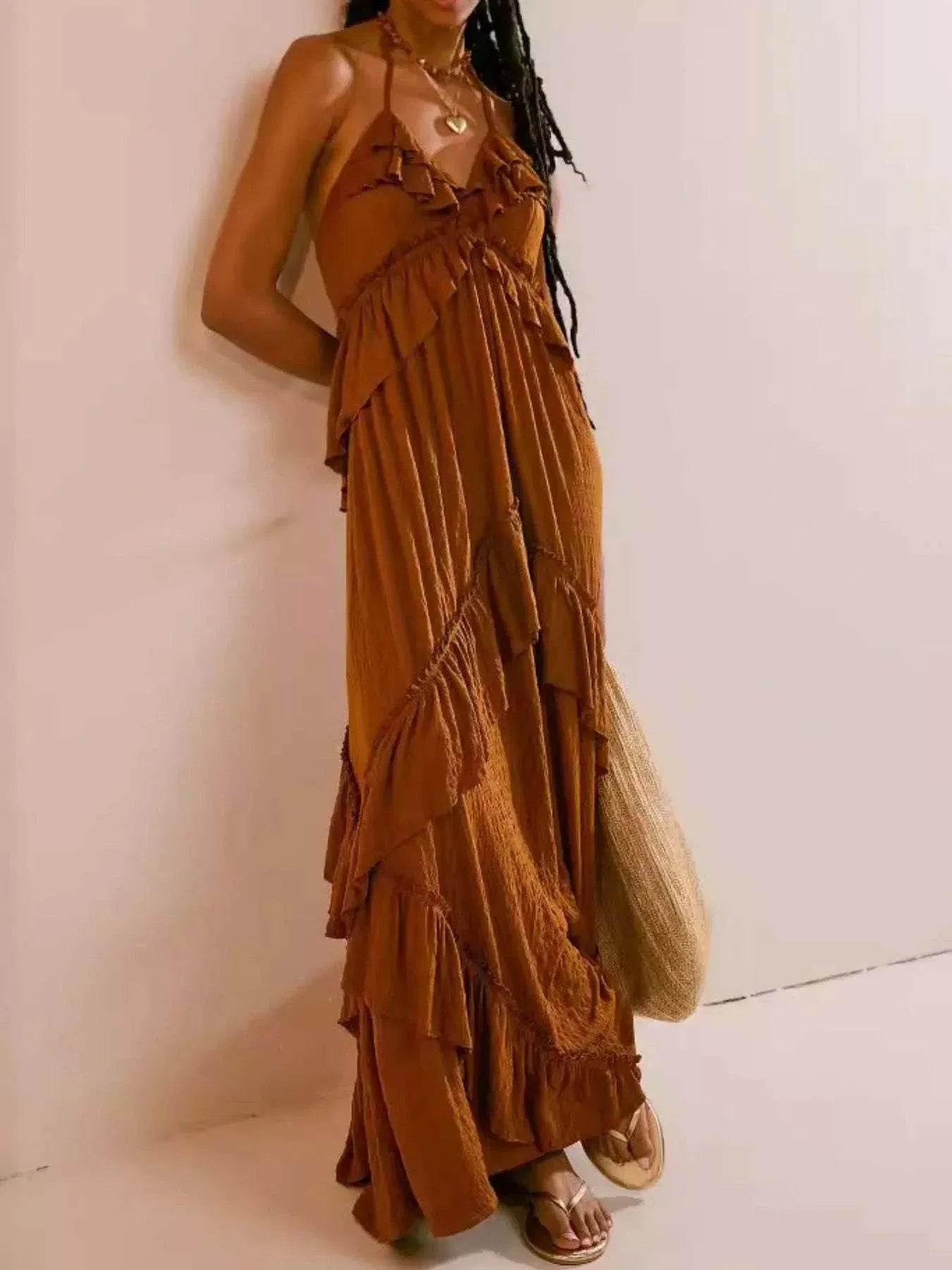 Ruffled halter neck maxi dress in brown polyester with tiered ruffles and tied halter straps