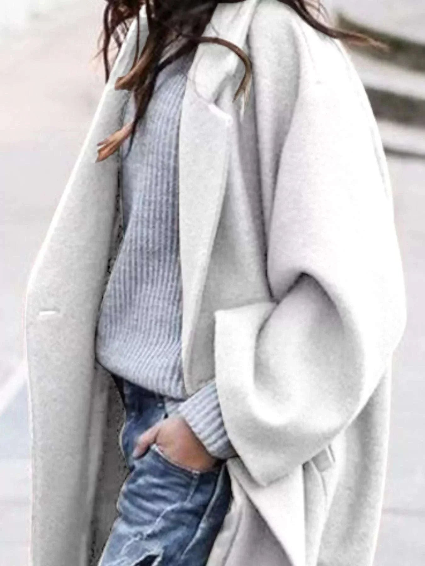 Plus size full size wool blend longline overcoat with pockets and button closure in light gray color.