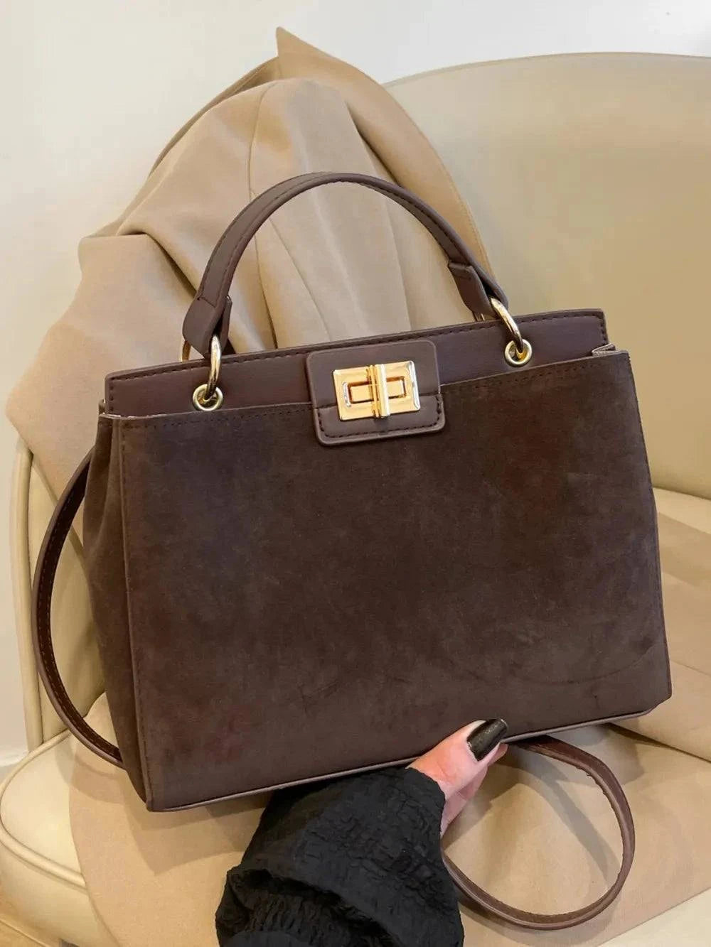 Solid Color Handbag with Removable Strap for Versatile Styling.
