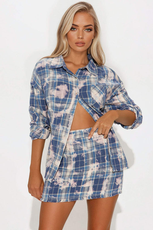 Woman wearing blue Brianne Plaid Skirt Set with button-up shirt and mini skirt