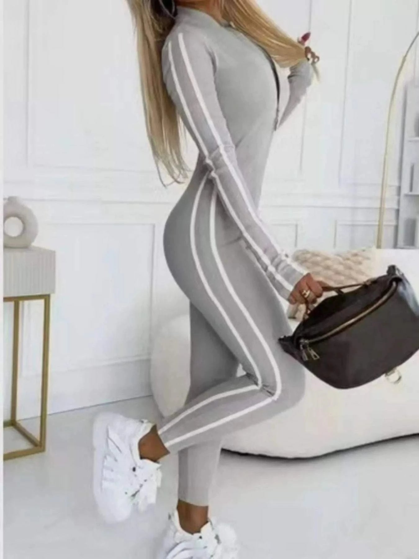 Full Size Stripe Zip-Front Long Sleeve Jumpsuit Plus SizeFeatures:Zipper
Material composition:100% polyester
Care instructions:Machine wash cold. Tumble dry low.
Imported
Product Measurements (Measurements by inches) &amp;Redemption By Ashley NorthStripe Zip-Front