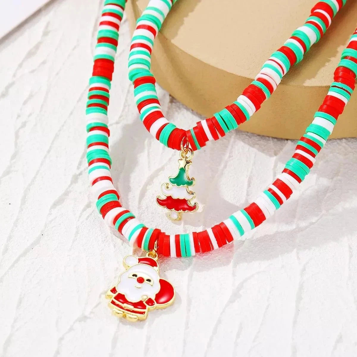 Alloy Christmas Necklace with Santa and Christmas Tree PendantPieces:1-piece
Material:18K Gold-Plated,Alloy,Soft clay
Care instructions:
1. Use a soft cloth to wipe. After each wear, you can use a soft cloth to wipe.2. Avoid coRedemption By Ashley NorthAlloy Christmas Necklace