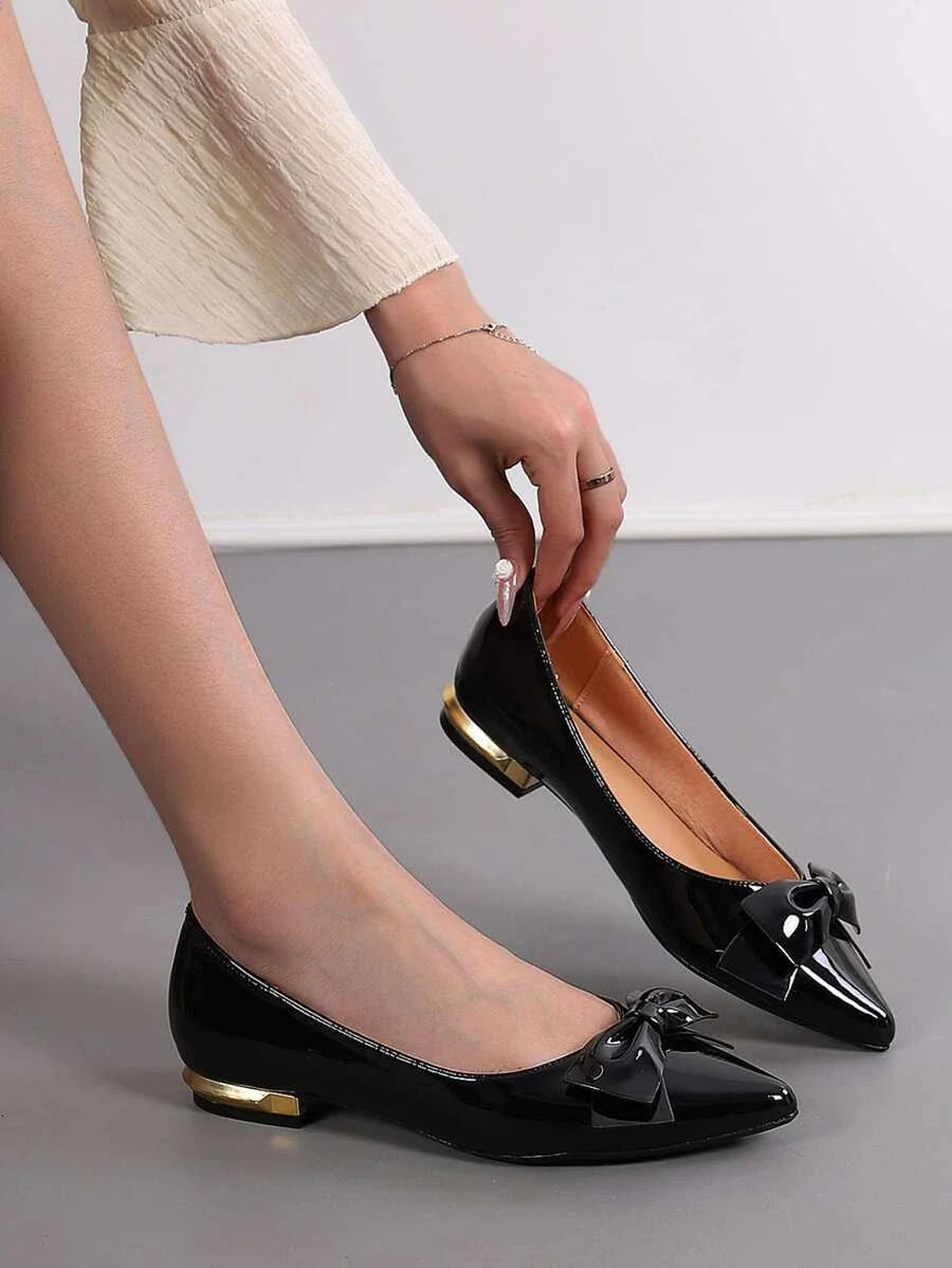 Women Bow Decor black patent leather point toe flats with bow detail and gold heel accent