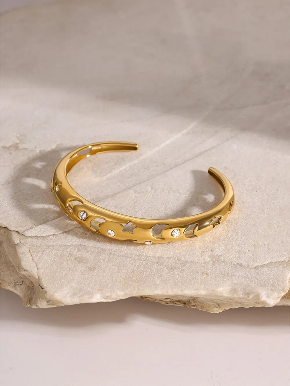 Stainless Steel Inlaid Rhinestone Cutout Bracelet.