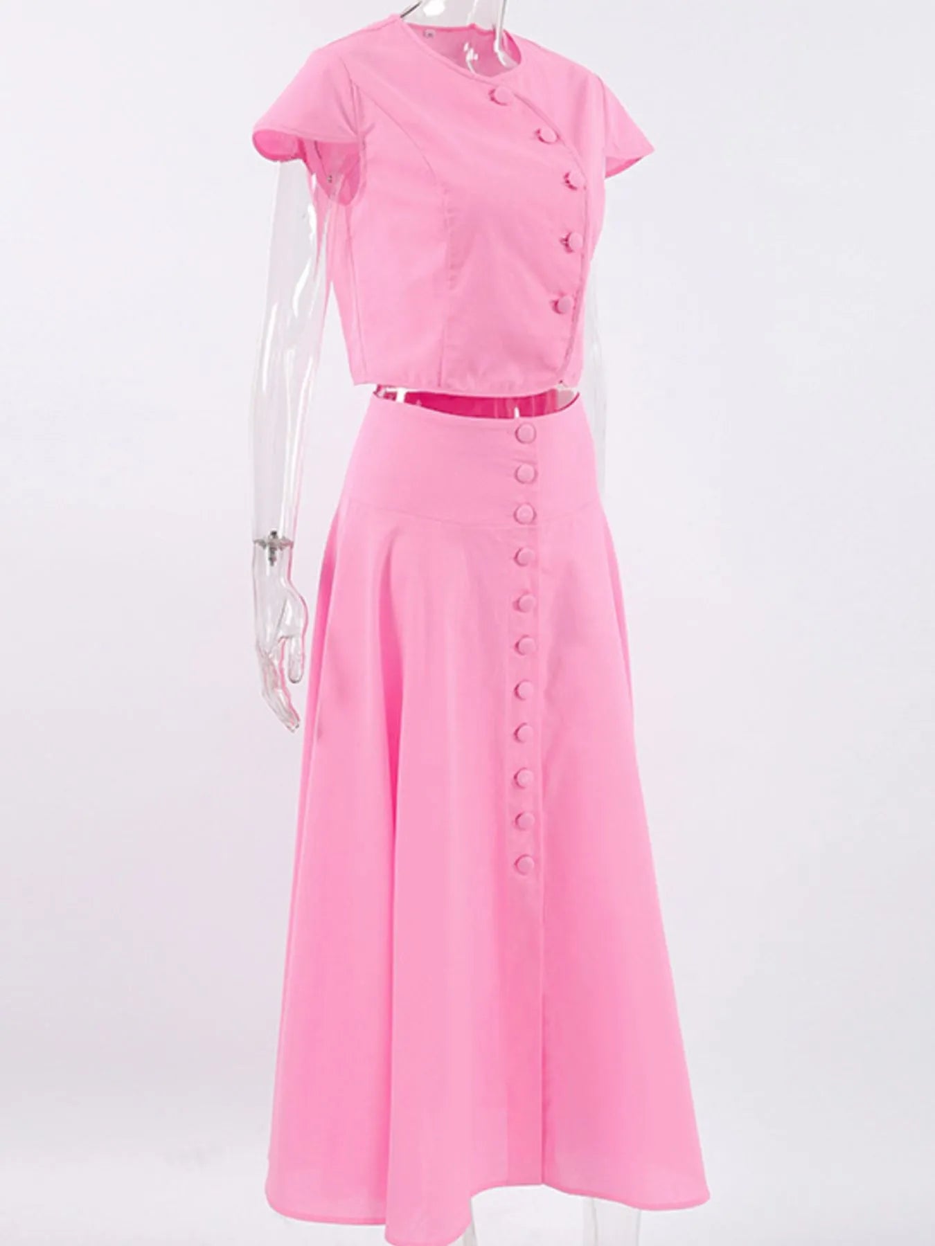 Pink two-piece short sleeve top and skirt set with buttoned front, 100% cotton, no stretch