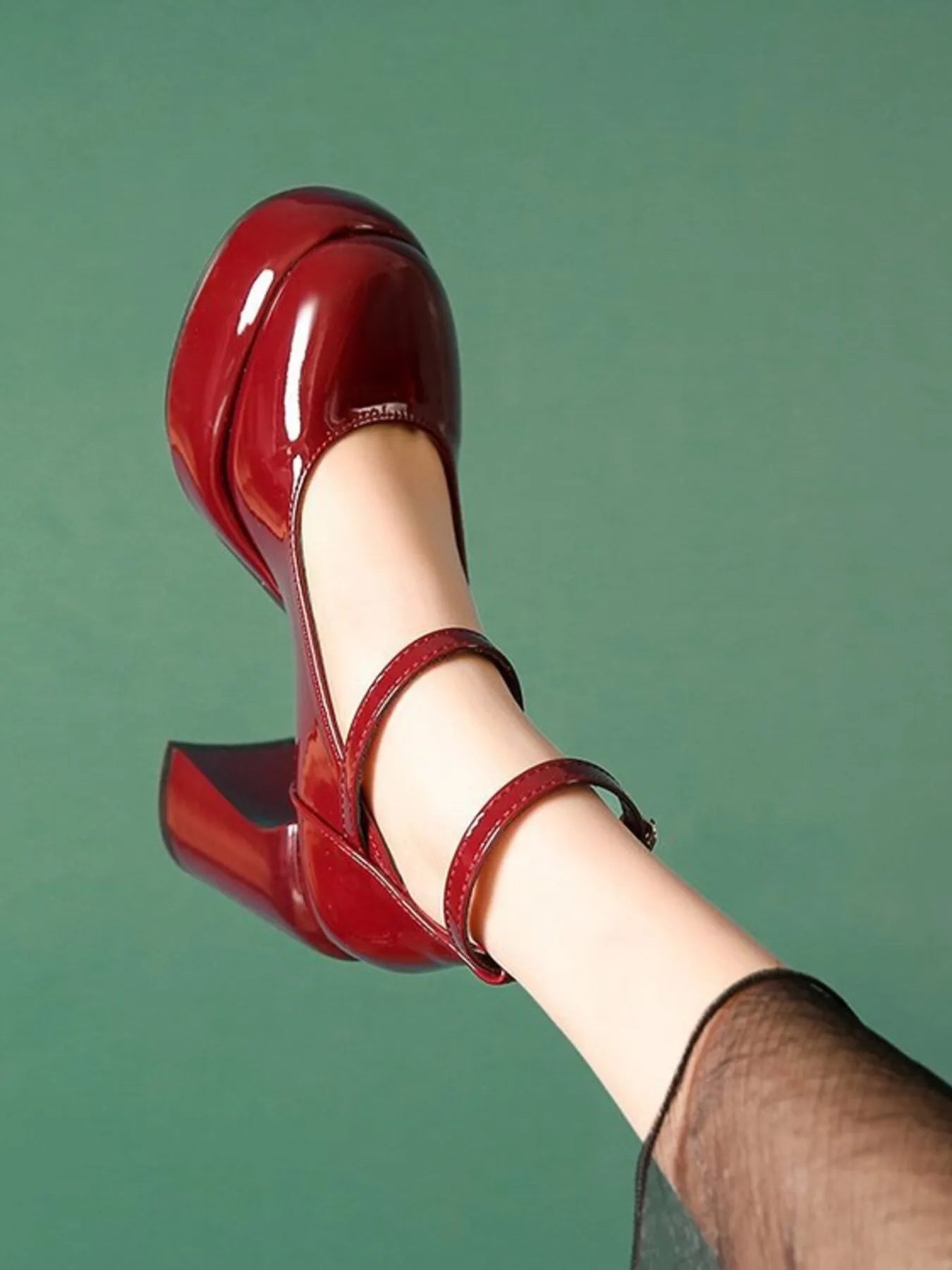 Patent Leather Mary Jane Platform Pumps.