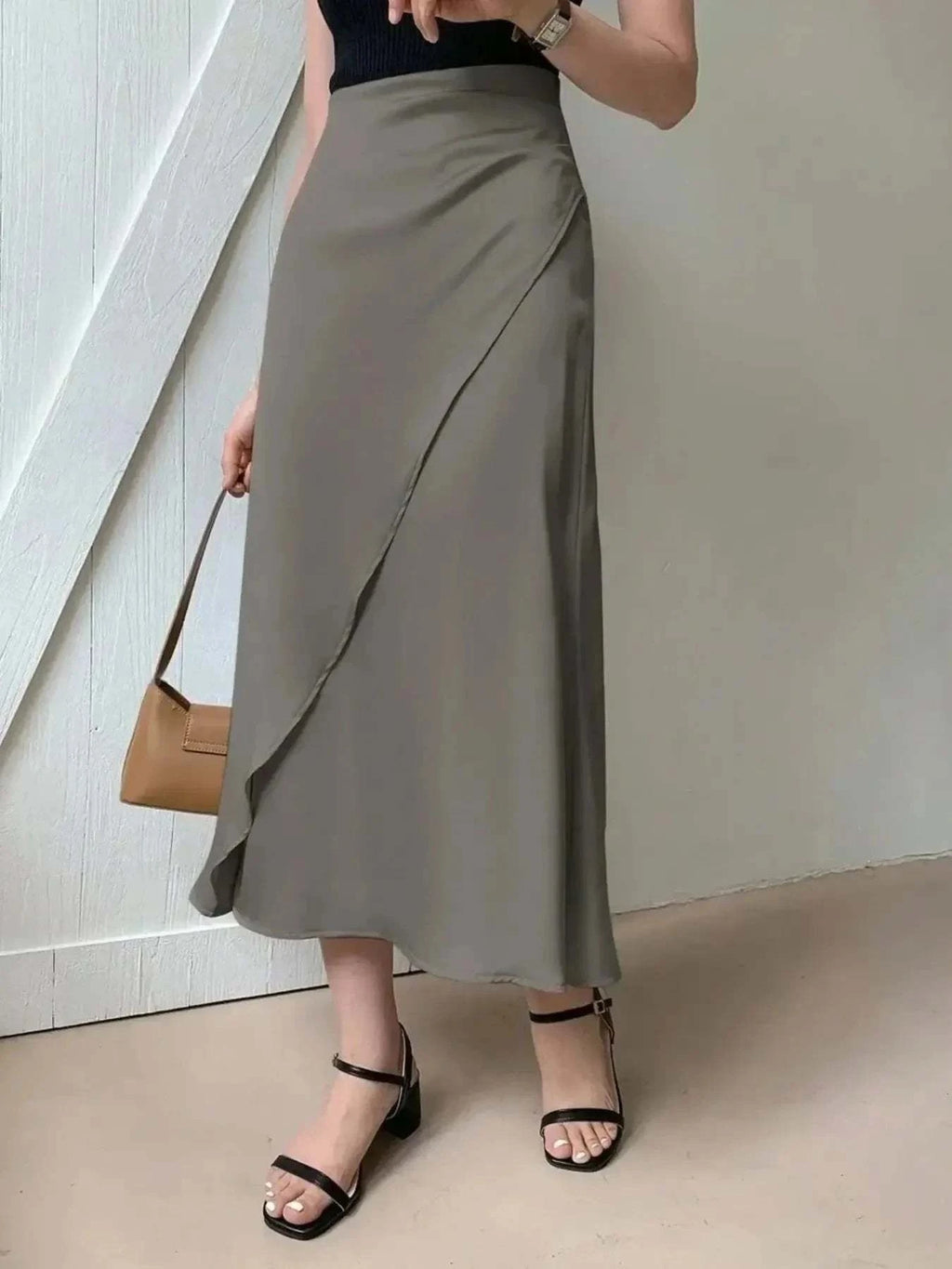 Asymmetric Midi Skirt with Fluted Hem.