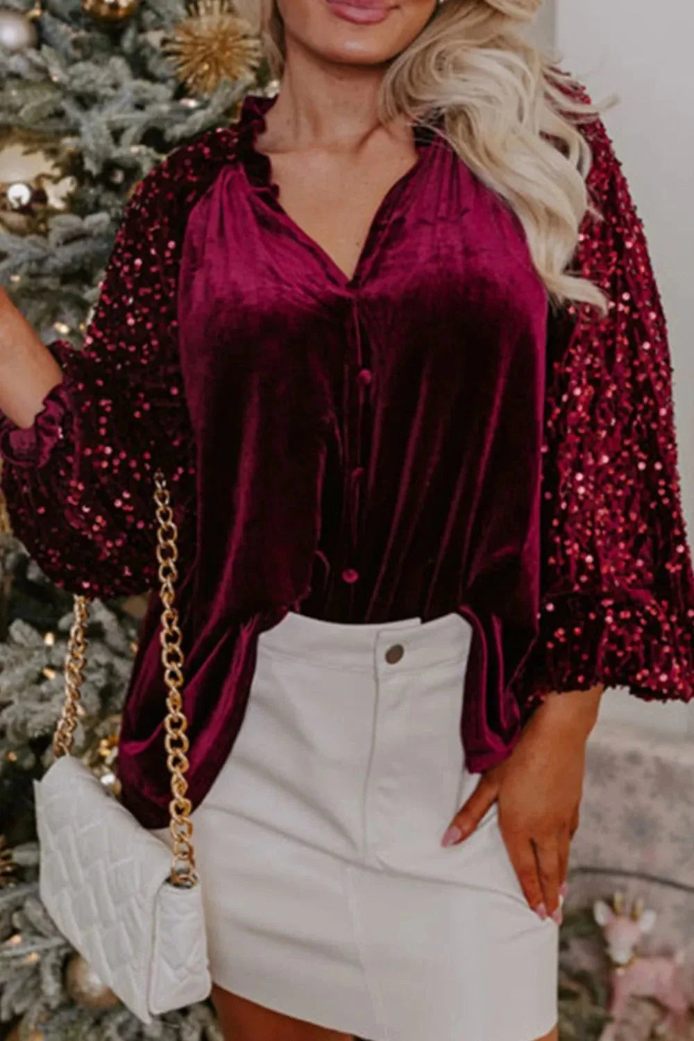 Women's burgundy sequin notched long sleeve blouse with slight stretch and opaque fabric