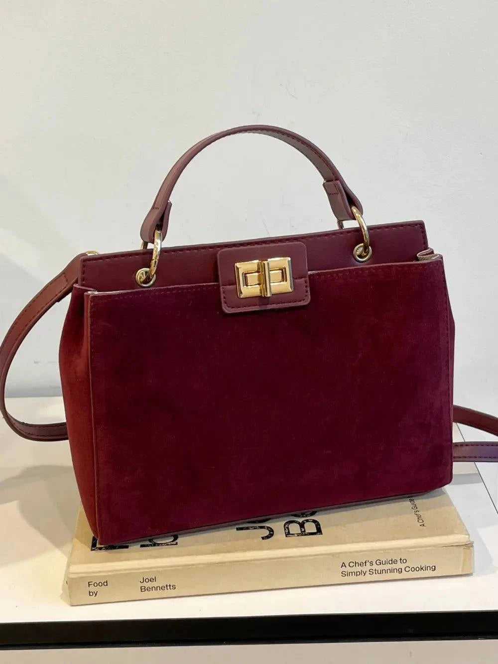 Solid Color Handbag with Removable Strap for Versatile Styling.