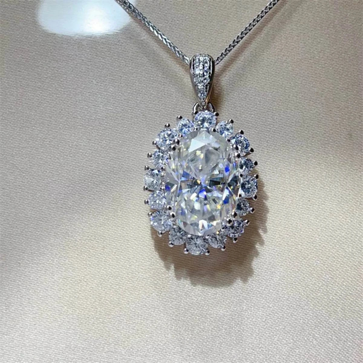 8 Carat Moissanite sterling silver pendant necklace with platinum plating and diamond-like halo design