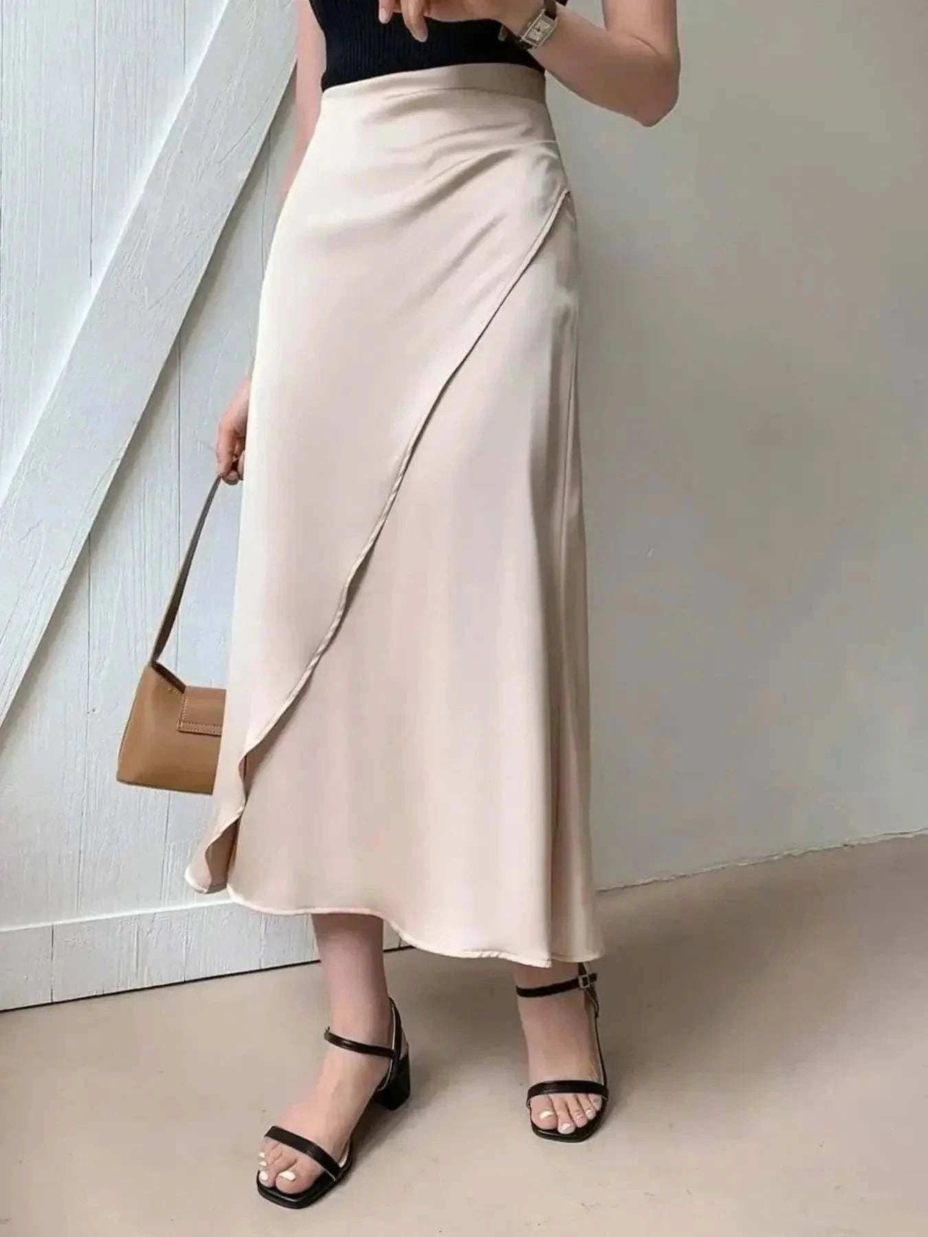 Asymmetric Midi Skirt with Fluted Hem.