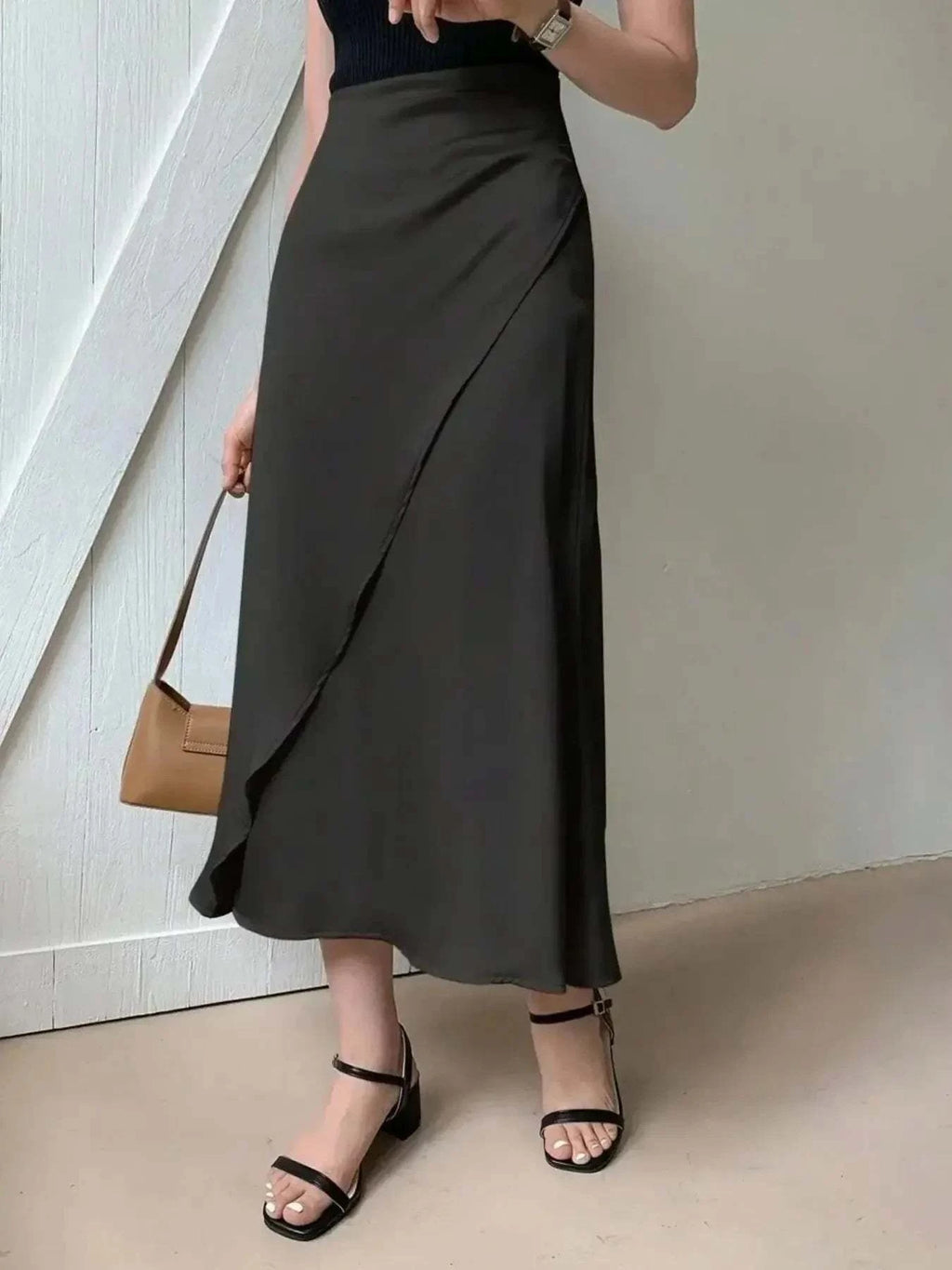 Asymmetric Midi Skirt with Fluted Hem.