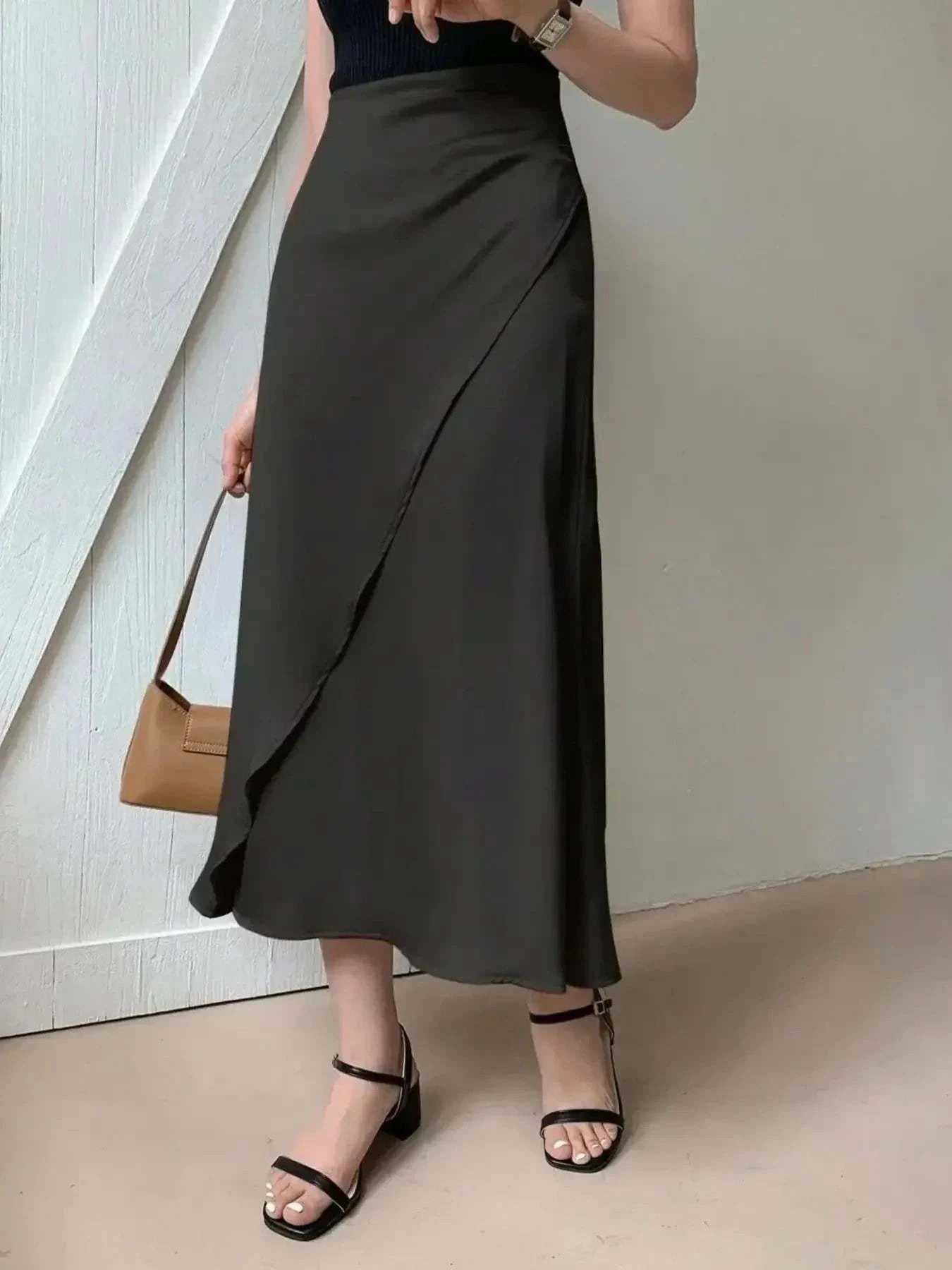 Asymmetric Midi Skirt with Fluted Hem.