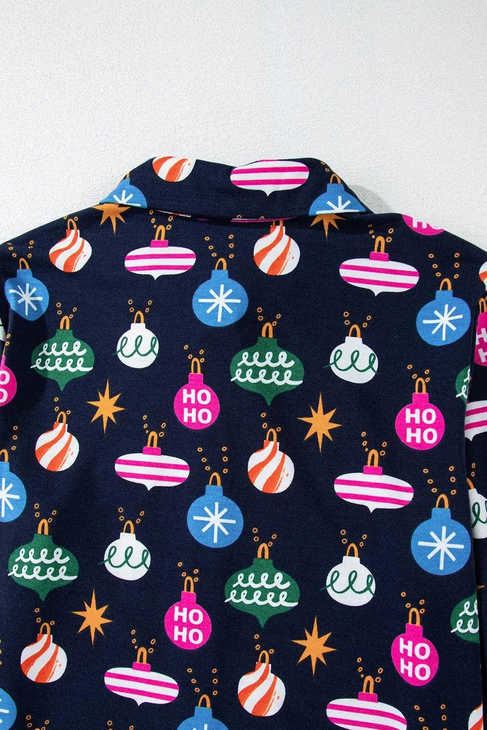 Christmas Lights Print Collared Neck Top and Pants SetFeatures: Basic style
Number of pieces: One-piece
Stretch: Slightly stretchy
Material composition: 95% polyester, 5% elastane
Care instructions: Machine wash cold. TRedemption By Ashley NorthChristmas Lights Print