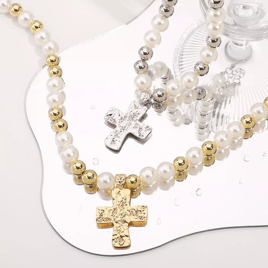Pearl and cross pendant necklace with synthetic pearls and 18K gold-plated accents on adjustable chain