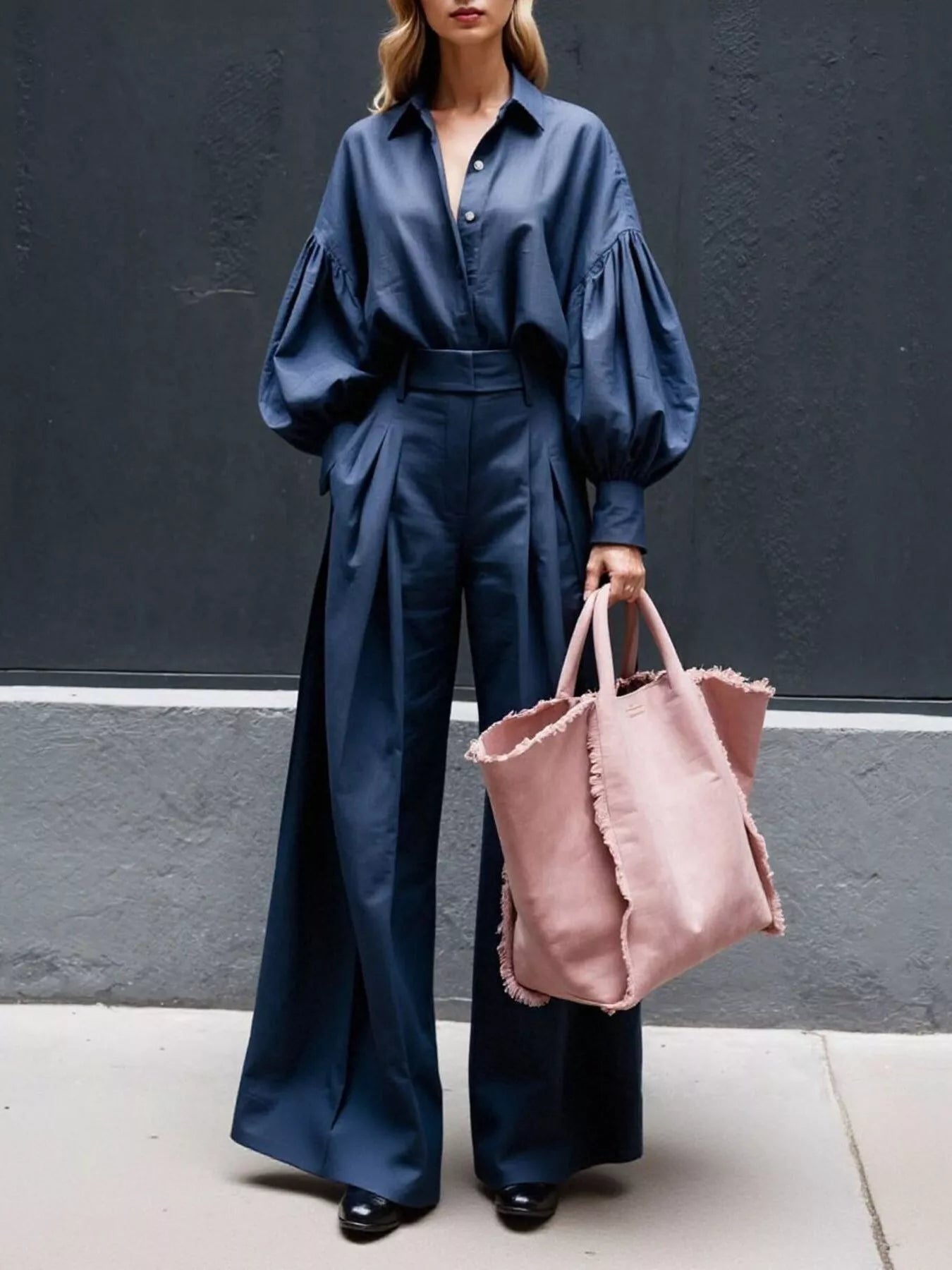 Navy two-piece set with lantern sleeve shirt and wide leg pants styled with a pink tote bag