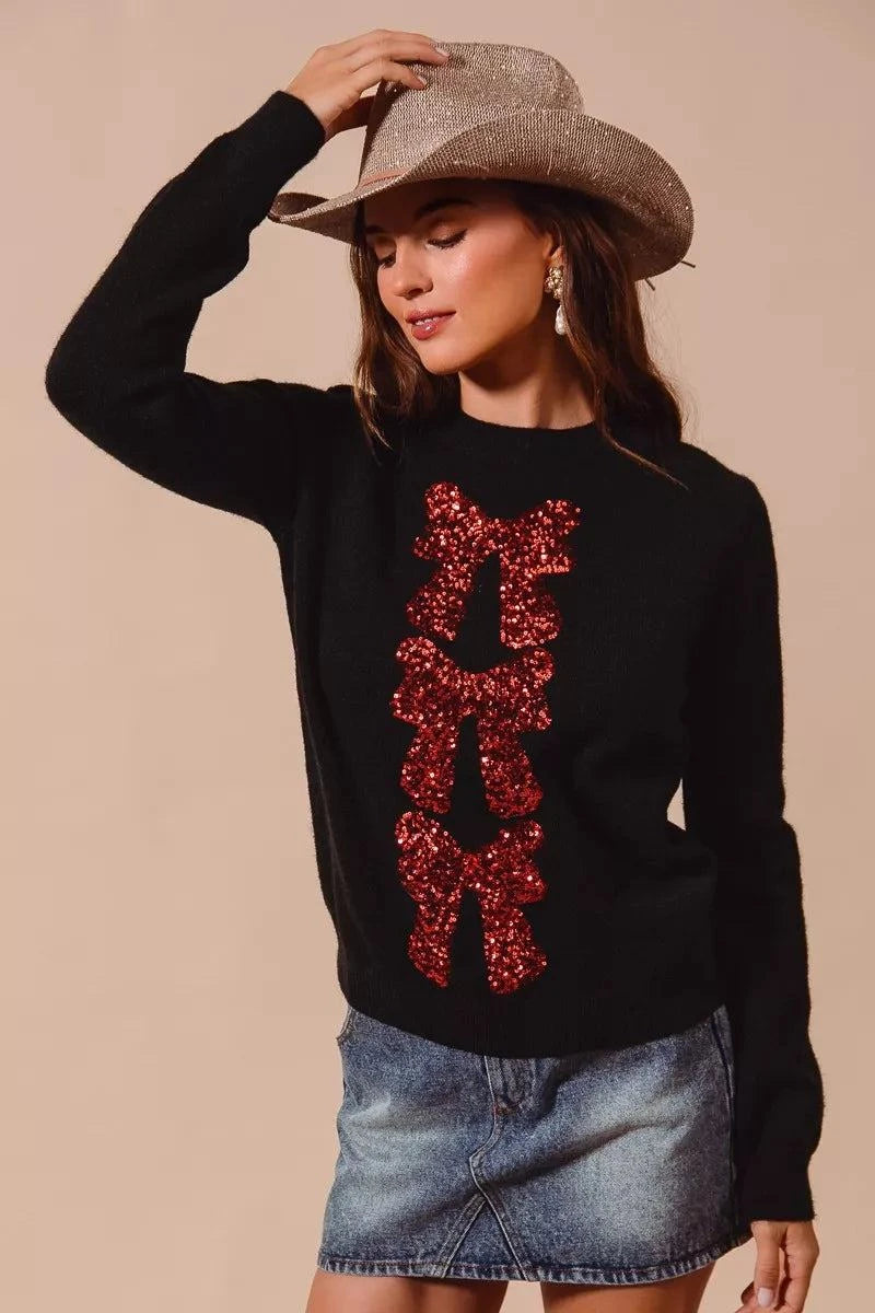 SO ME Sequins Bow Ribbon Embellished Christmas SweaterThis Christmas sweater is embellished with sparkly sequins and a charming bow ribbon for a festive and eye-catching look. The sequins add a touch of glamour and shimRedemption By Ashley NorthSequins Bow Ribbon