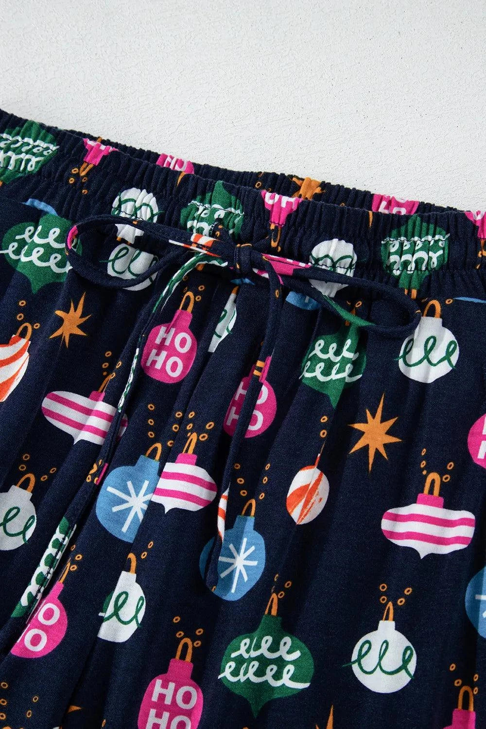 Christmas Lights Print Collared Neck Top and Pants SetFeatures: Basic style
Number of pieces: One-piece
Stretch: Slightly stretchy
Material composition: 95% polyester, 5% elastane
Care instructions: Machine wash cold. TRedemption By Ashley NorthChristmas Lights Print