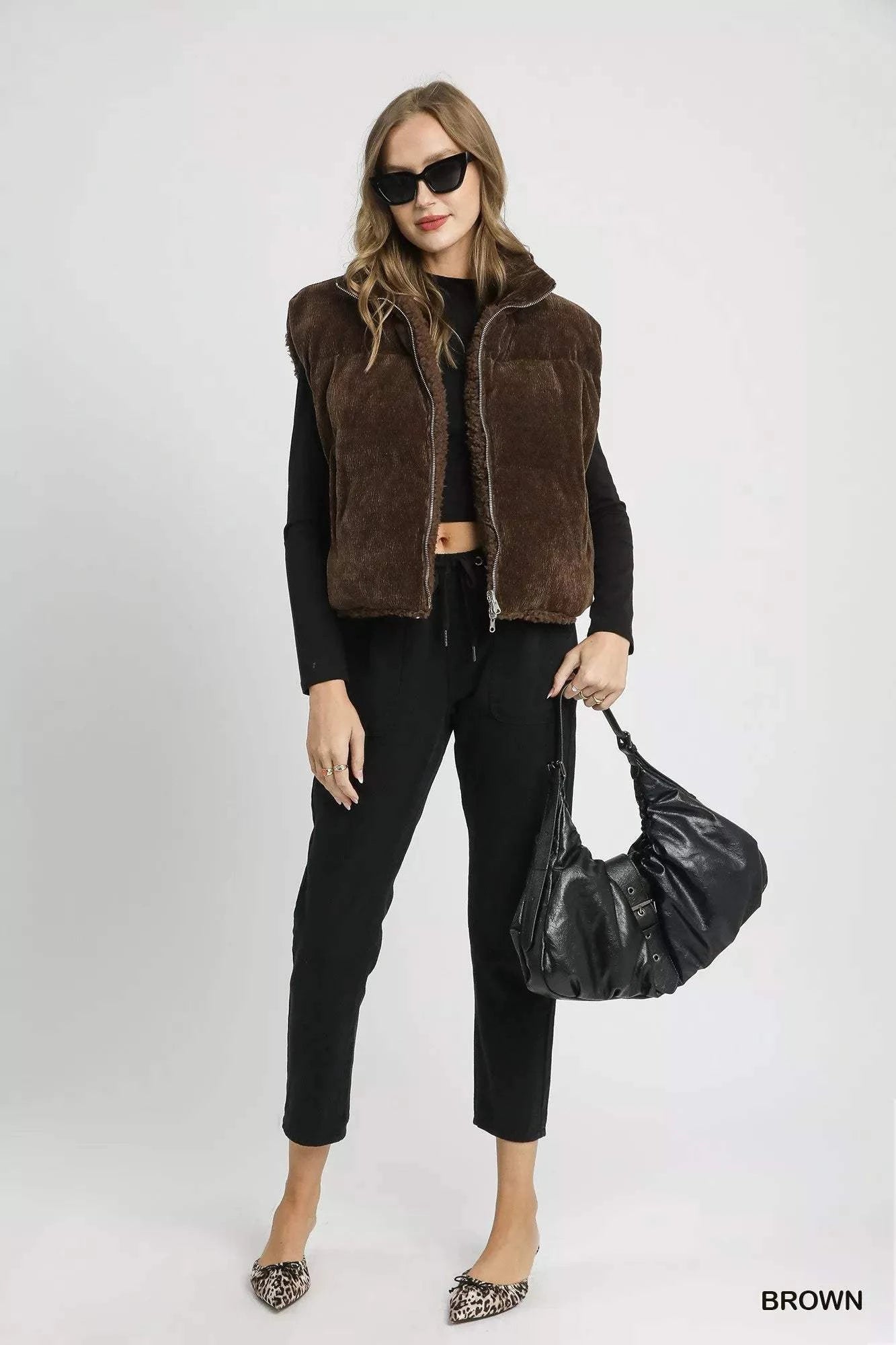 Umgee Sherpa-Lined Zip Vest with Drawstring Hem.