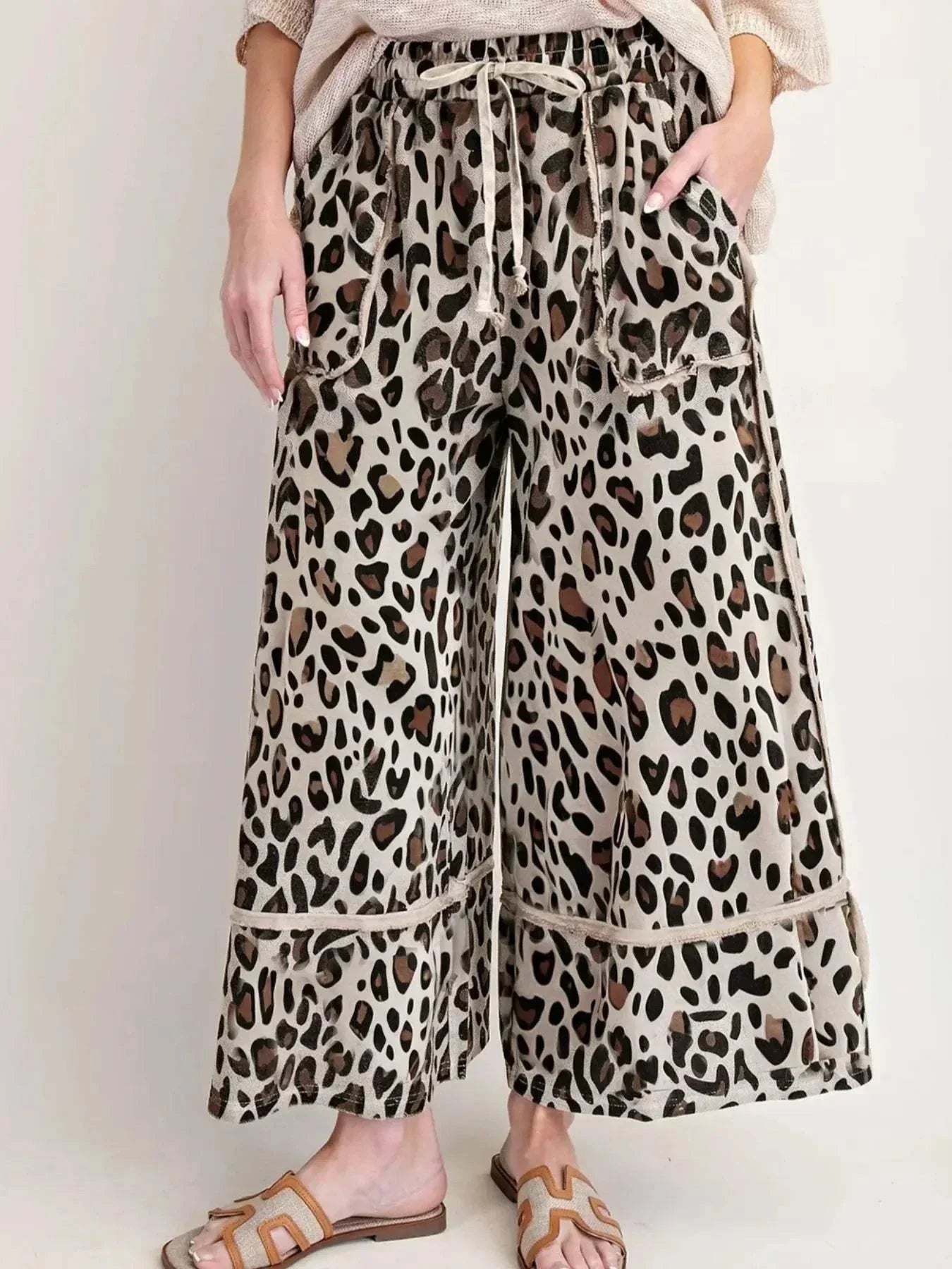 Leopard Print Wide Leg Drawstring PantsFeatures:Drawstring,Pocketed
Material composition:95% polyester, 5% elastane
Care instructions:Machine wash cold. Tumble dry low.
Imported
Product Measurements (MeasRedemption By Ashley NorthLeopard Print Wide Leg Pants