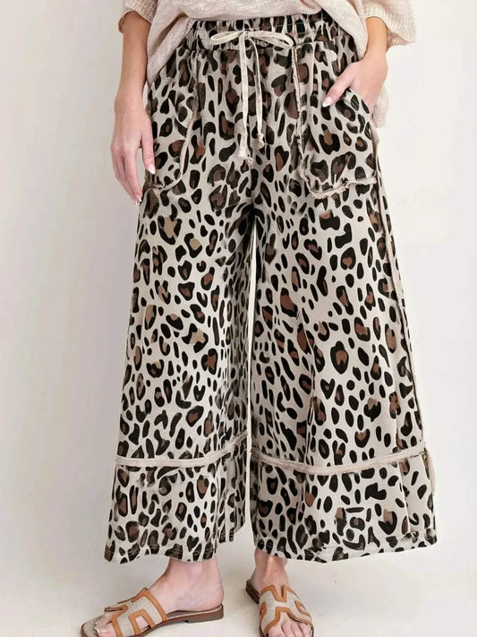 Leopard Print Wide Leg Drawstring PantsFeatures:Drawstring,Pocketed
Material composition:95% polyester, 5% elastane
Care instructions:Machine wash cold. Tumble dry low.
Imported
Product Measurements (MeasRedemption By Ashley NorthLeopard Print Wide Leg Pants