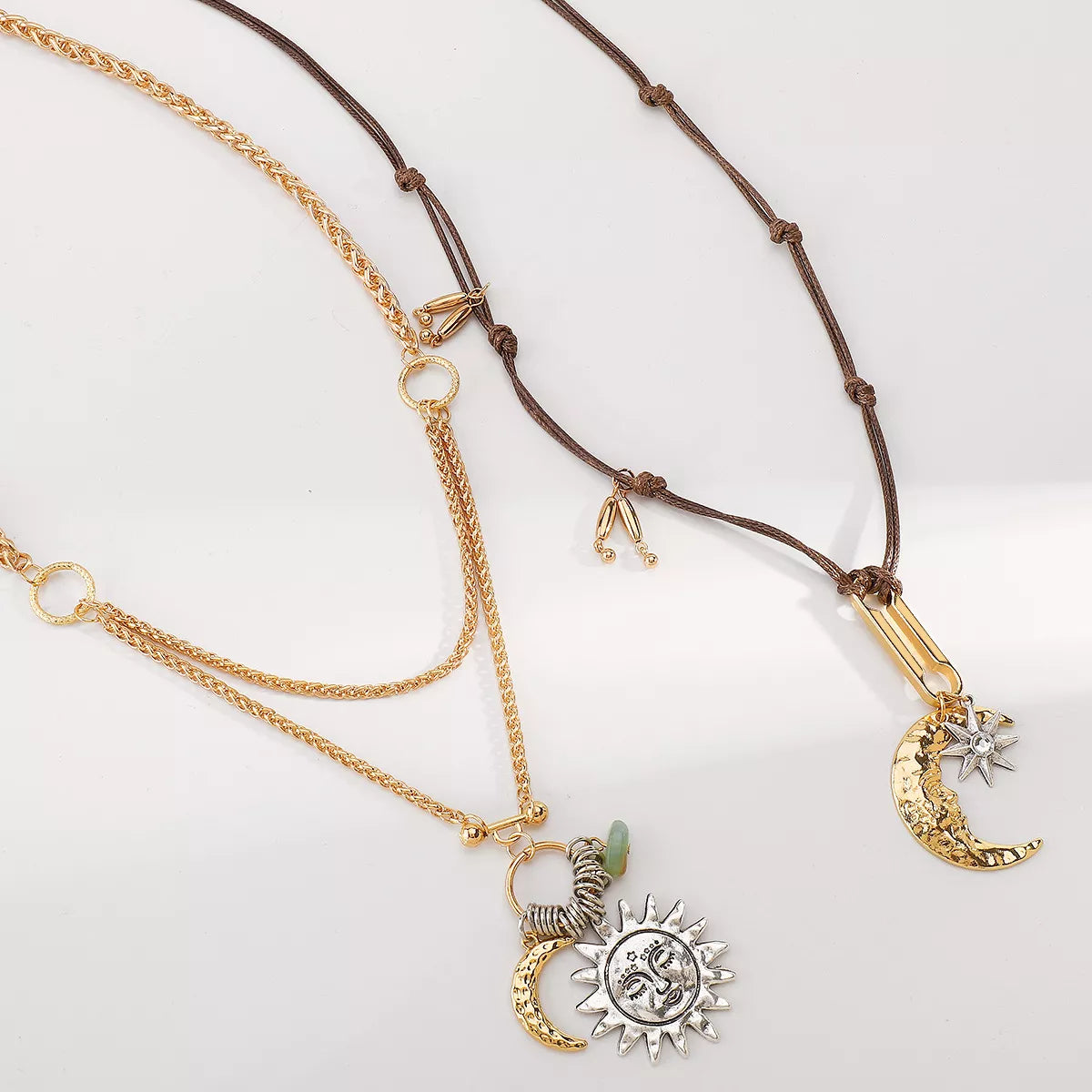 Moon & Sun pendant necklace with 18K gold-plated and silver-plated alloy chains in two styles