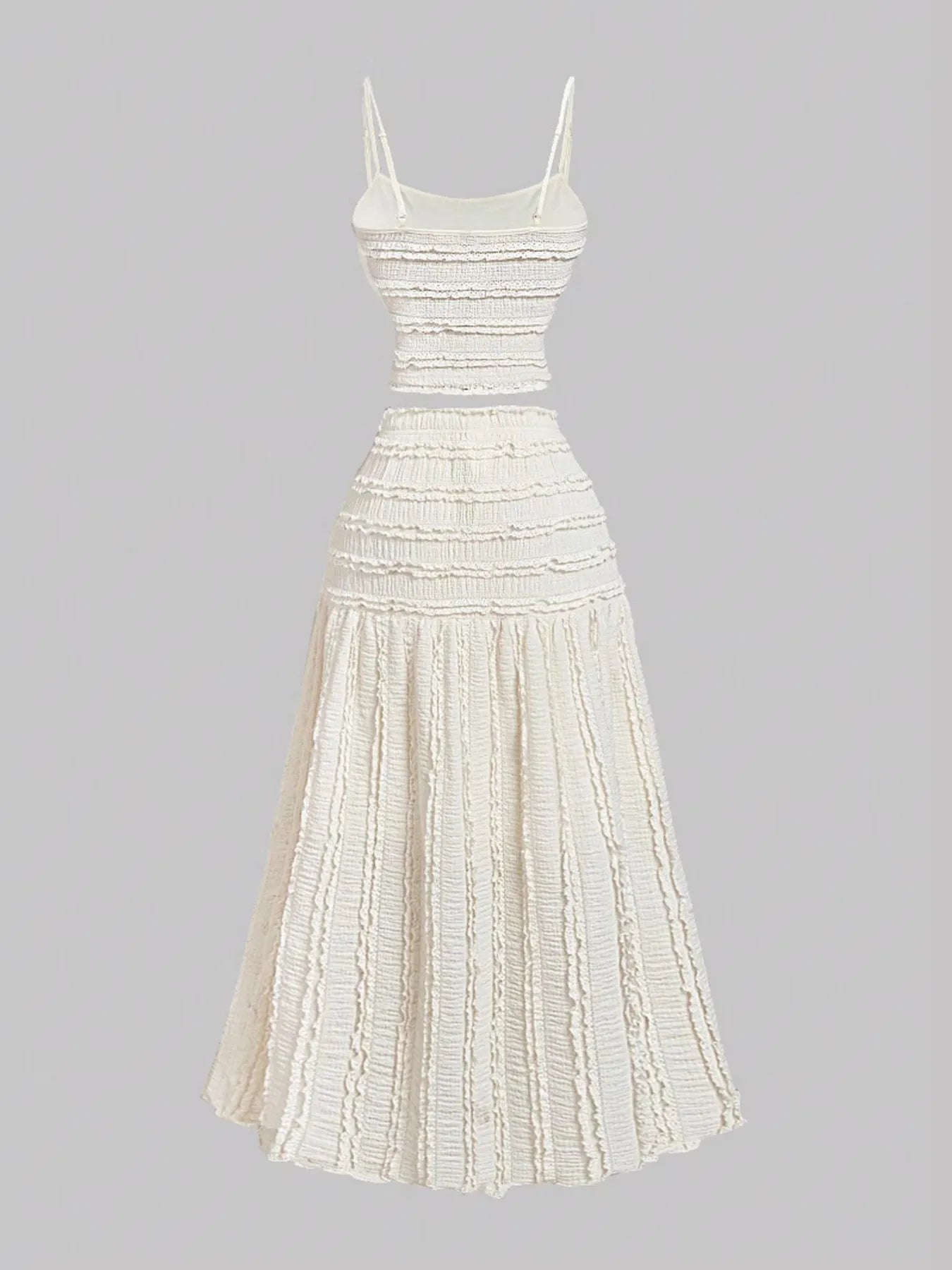 White frill scoop neck cami and tiered skirt set with ruched, smocked design, slightly stretchy polyester fabric.