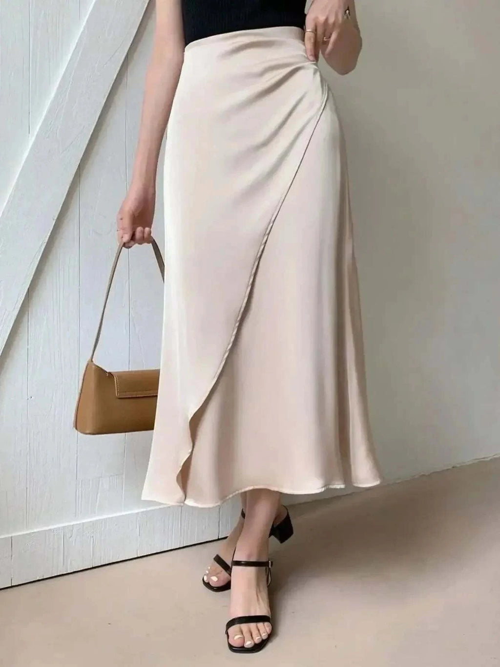 Asymmetric Midi Skirt with Fluted Hem.