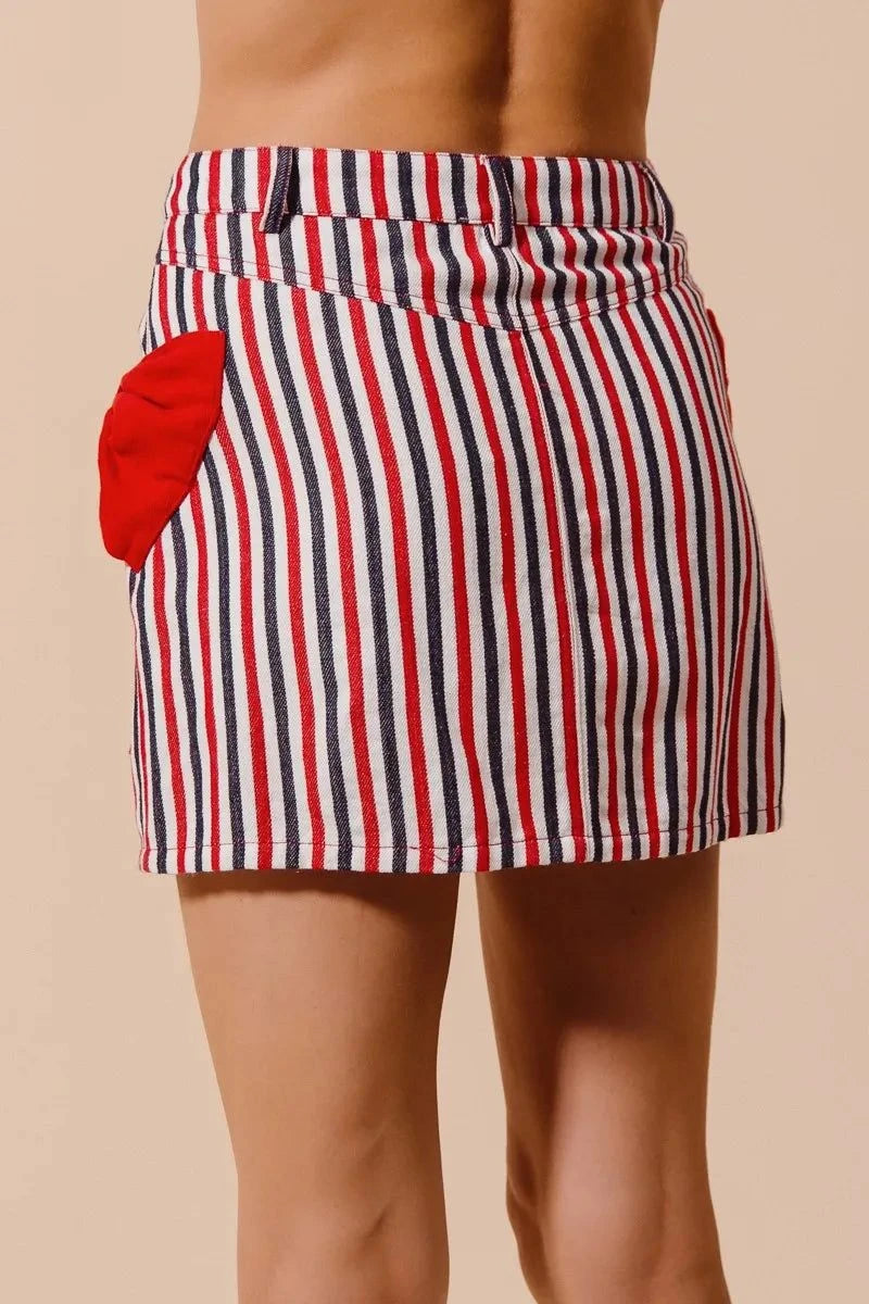 SO ME Contrast Bow Knot Pocket Fourth Of July Denim SkirtThis stylish striped denim mini skirt features a charming nautical-inspired design with bold red and white vertical stripes. Crafted from lightweight denim material,Redemption By Ashley NorthContrast Bow Knot