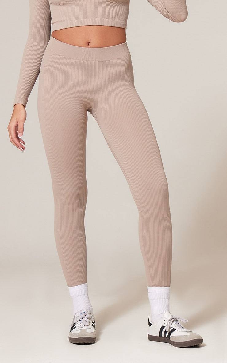 https://cdn-img.prettylittlething.com/4/4/c/5/44c54e353df4d09c24dbdd56f9154836eb66ec69_CMP0374_2_stone_structured_contour_rib_leggings.jpg