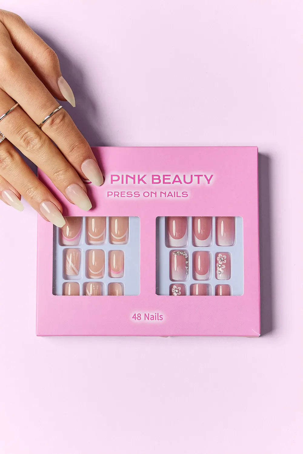 So Pink Beauty Press On Nails 2 Packs with 48-piece natural and decorated designs in pink box