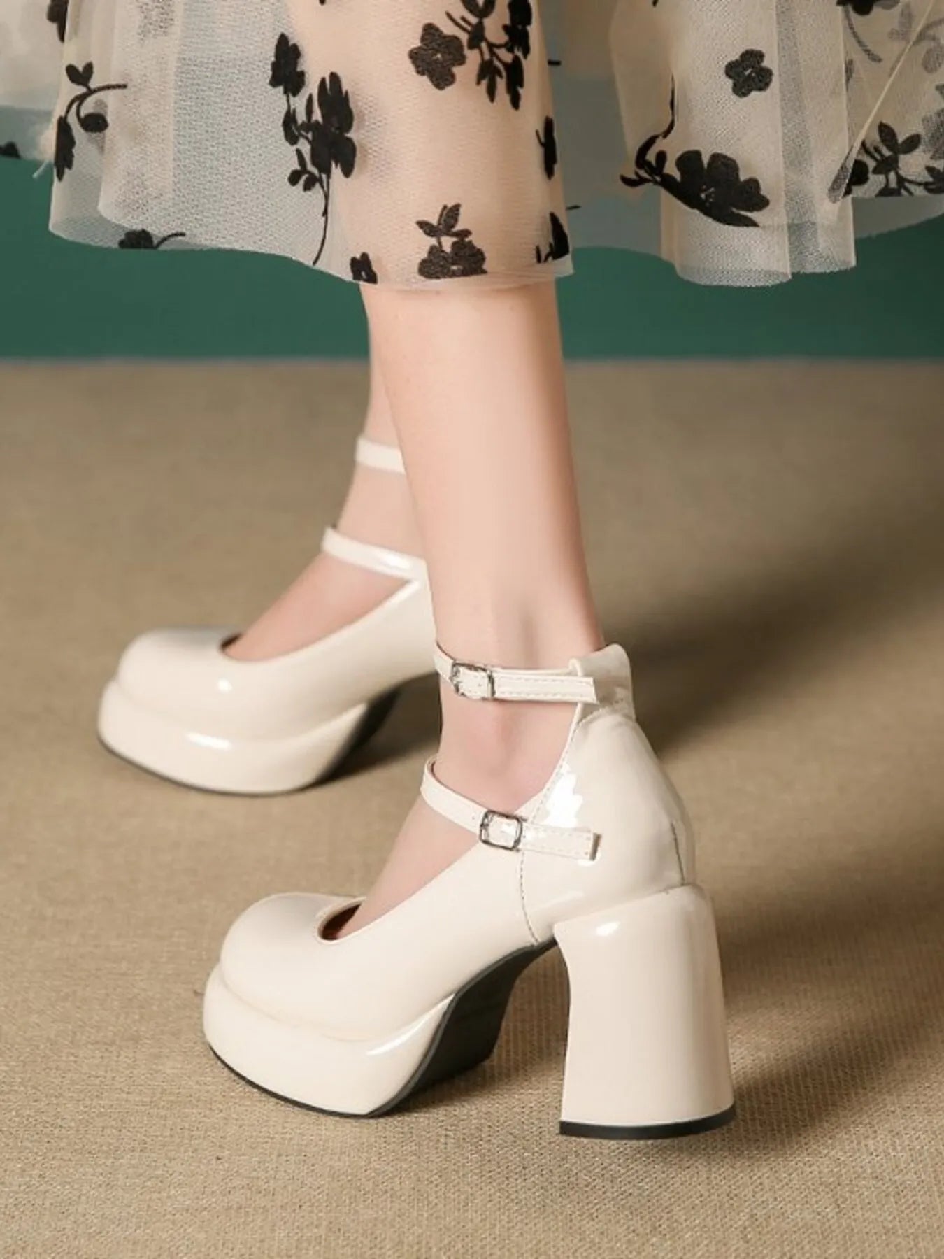 Patent Leather Mary Jane Platform Pumps.