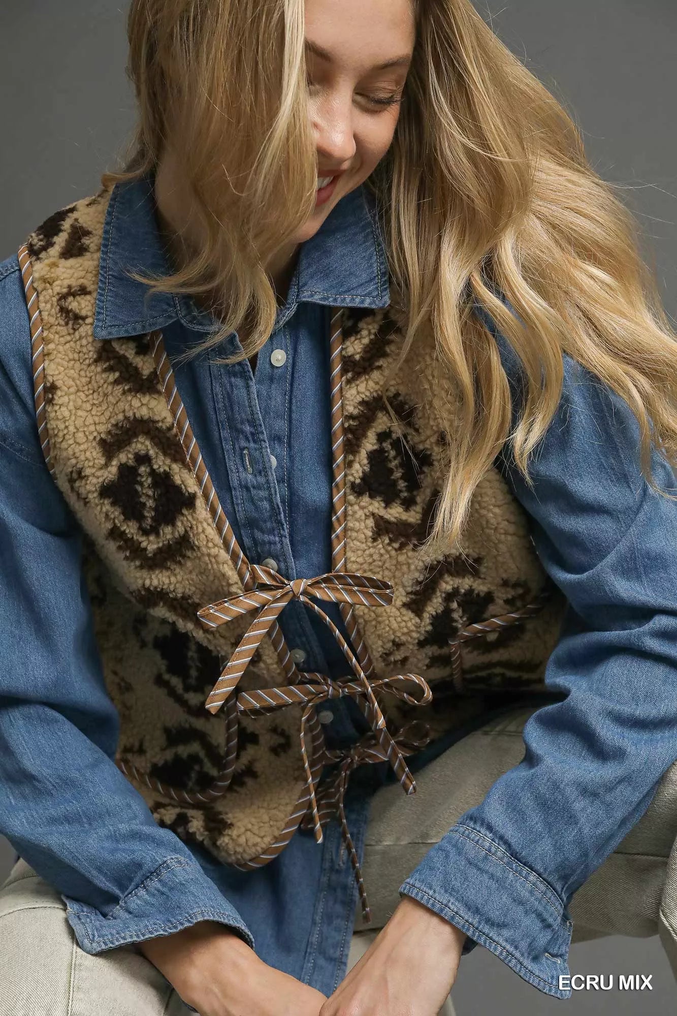 Umgee Mix Patterned Sherpa Tie-Front Vest.