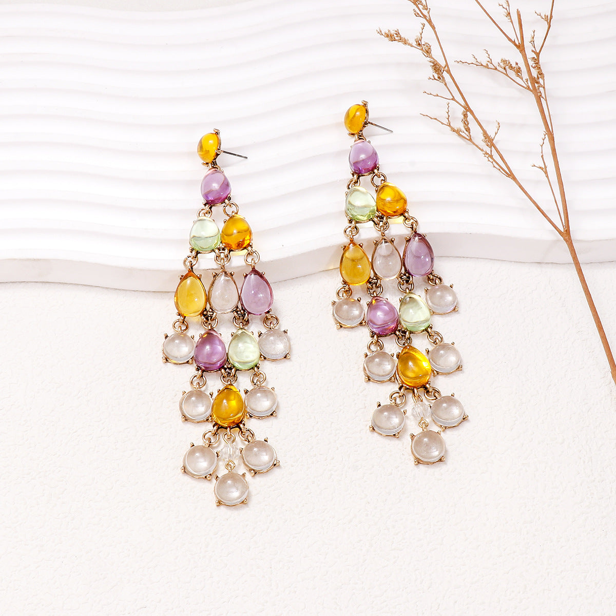 Alloy and rhinestone teardrop earrings with multicolored stones and gold-tone setting