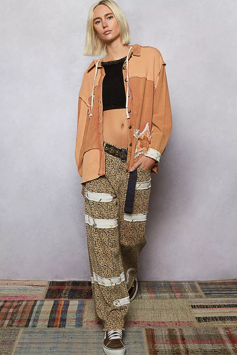 POL Button Down Hooded Jacket with star patch pattern in twill and thermal fabric worn with printed cargo pants