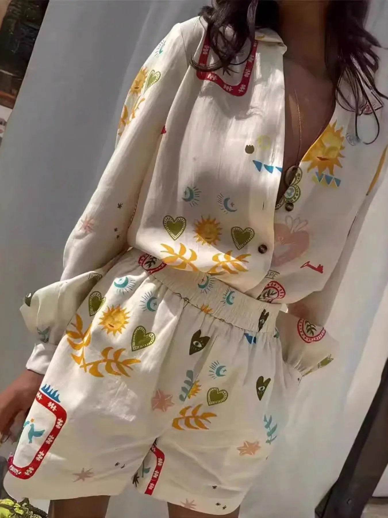 Button Up Long Sleeve shirt and shorts set with colorful sun and heart prints, slightly stretchy linen blend fabric.
